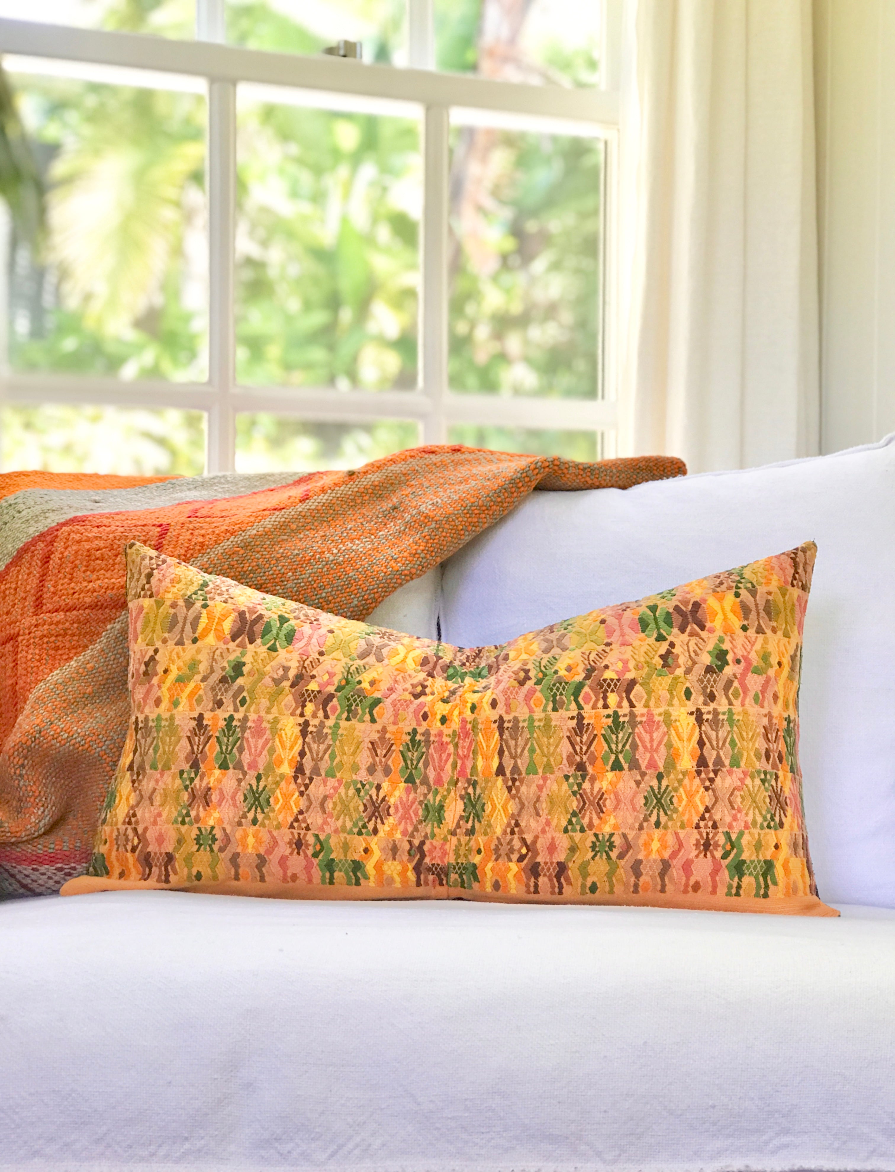 Vintage textile pillows made from a Guatemalan huipil and corte.