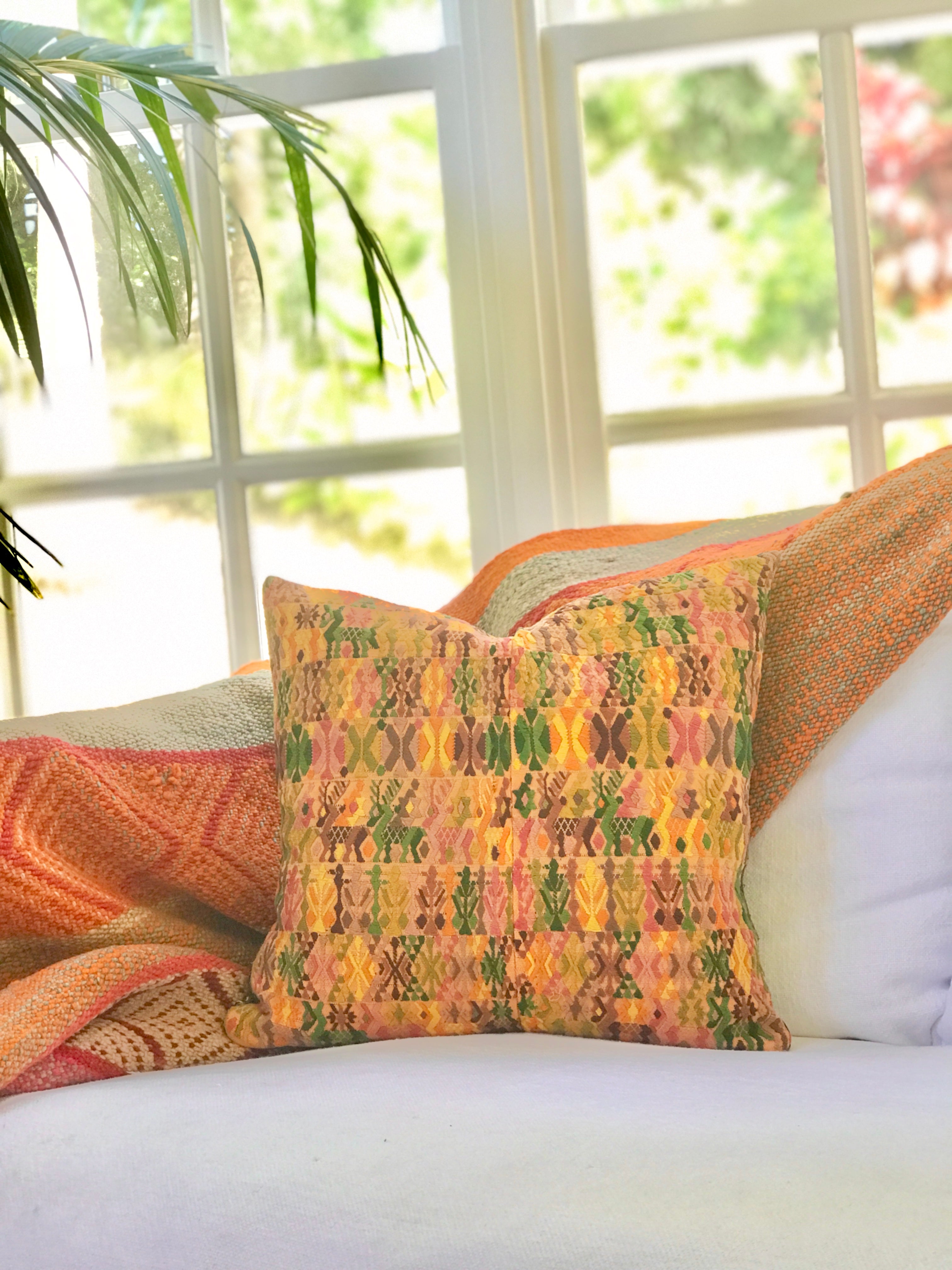 Vintage textile cushions made from a Guatemalan huipil and corte.