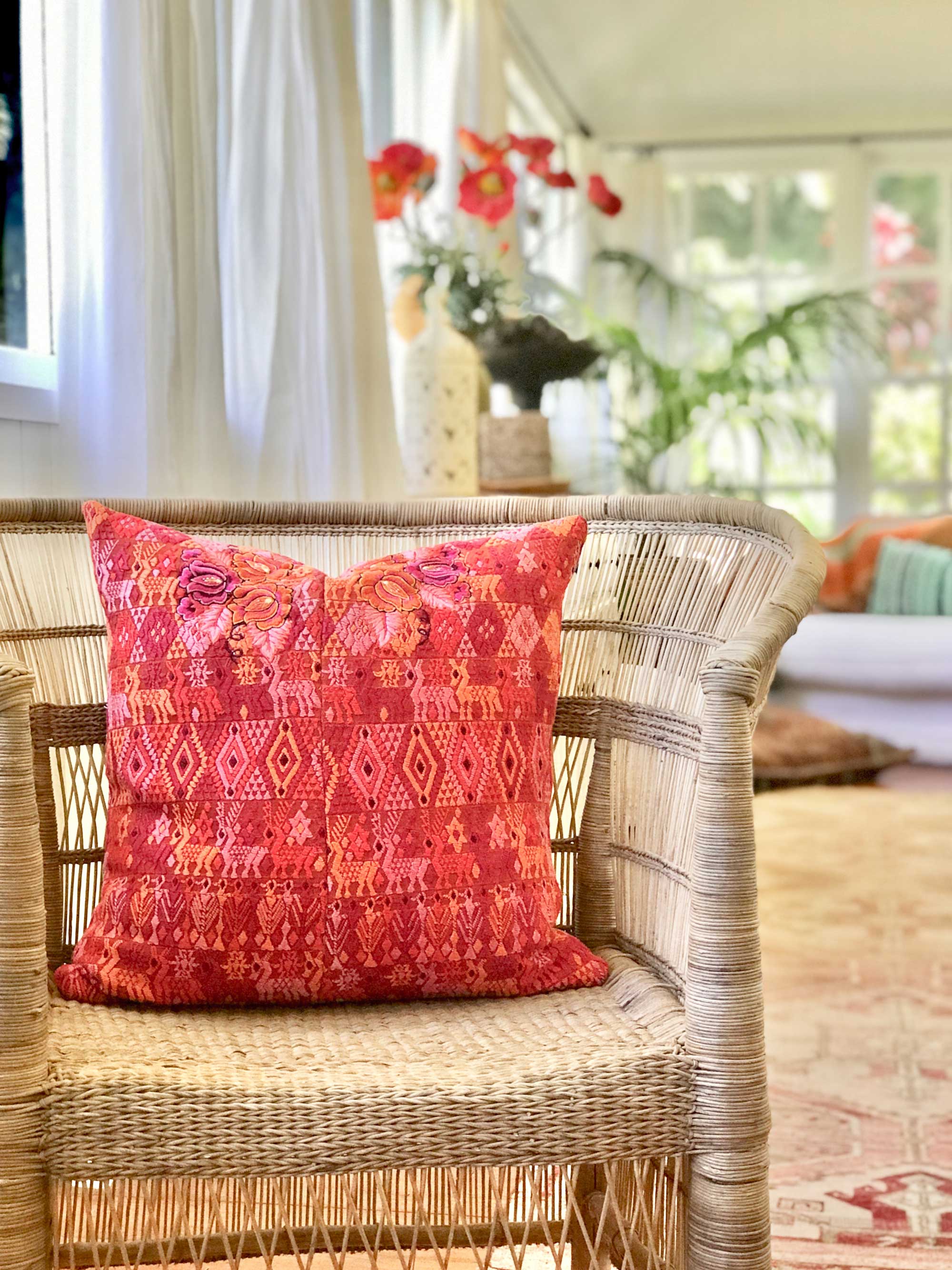 Vintage textile cushions made from a Guatemalan huipil and corte.