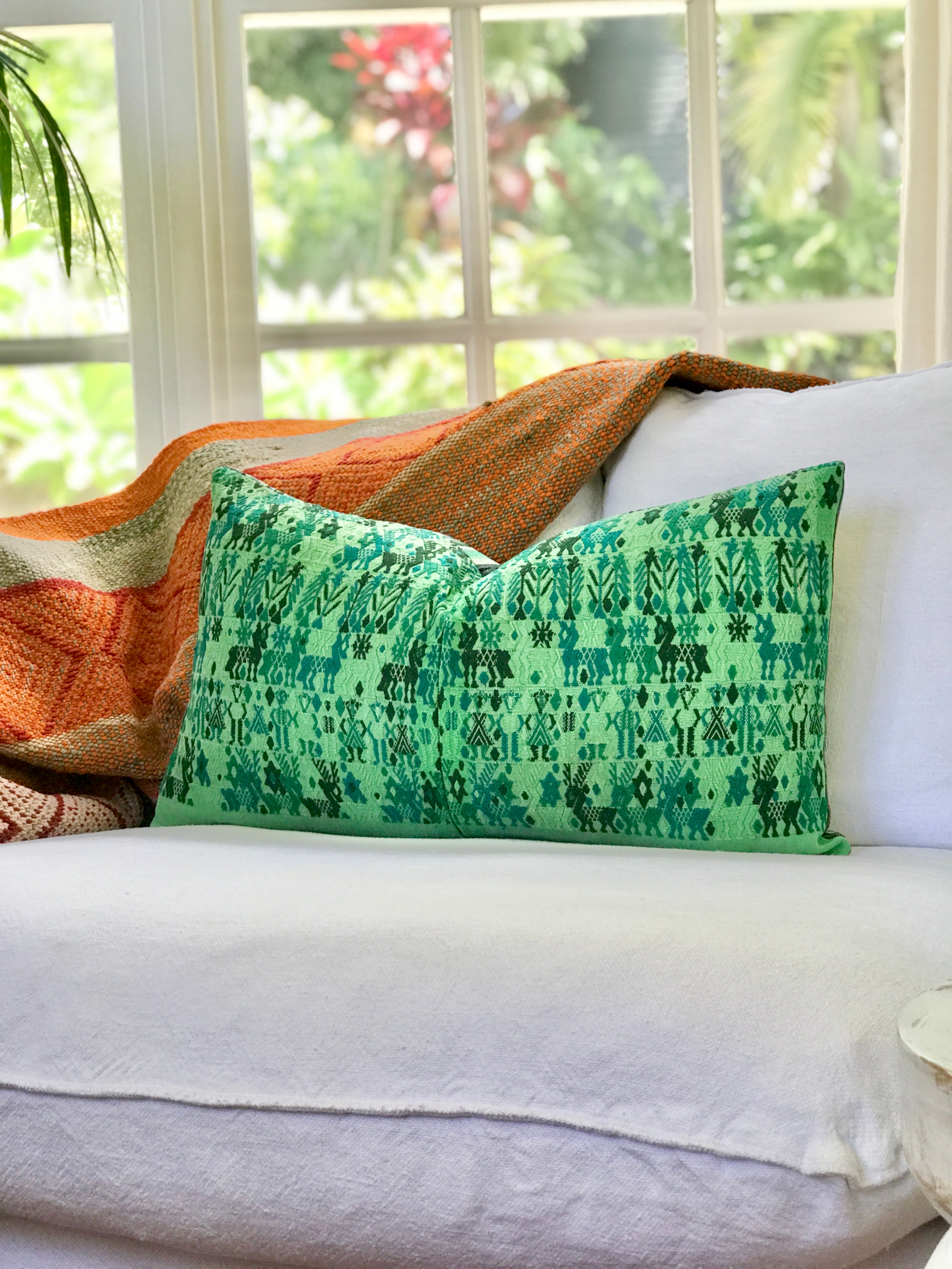 Vintage textile cushions made from a Guatemalan huipil and corte.
