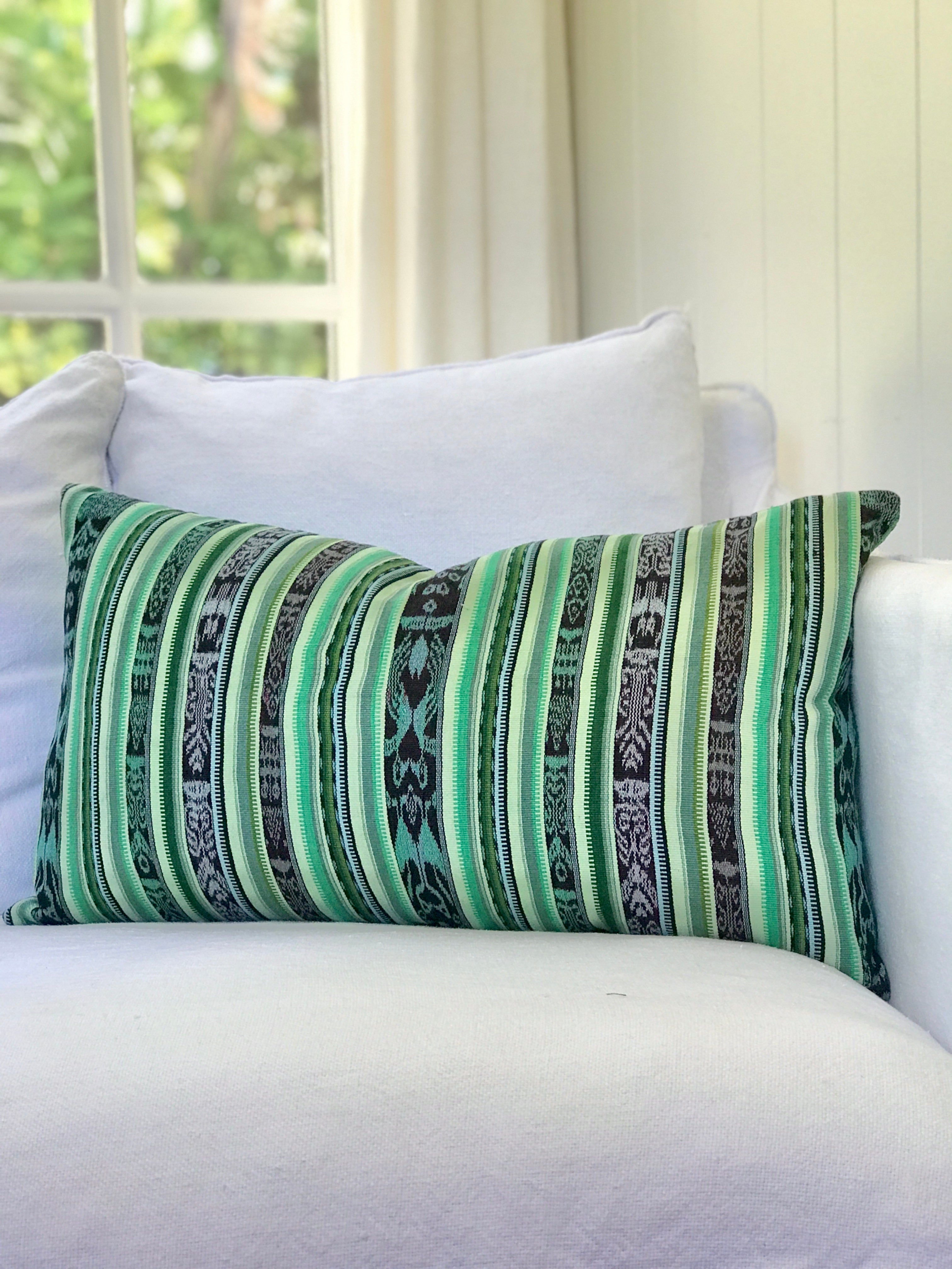 Vintage textile cushions made from a Guatemalan huipil and corte.