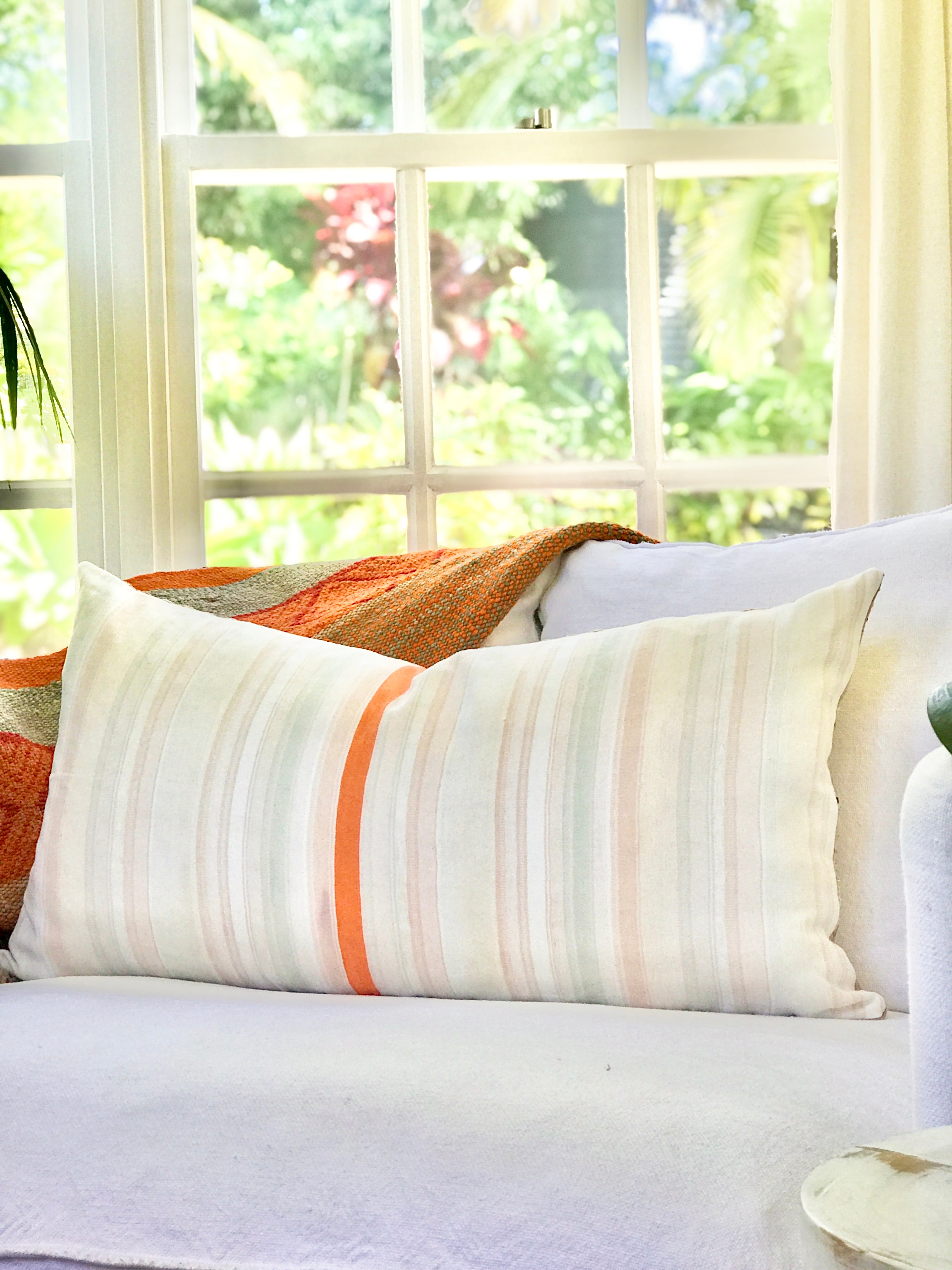 Vintage textile pillows made from a Guatemalan huipil and corte.