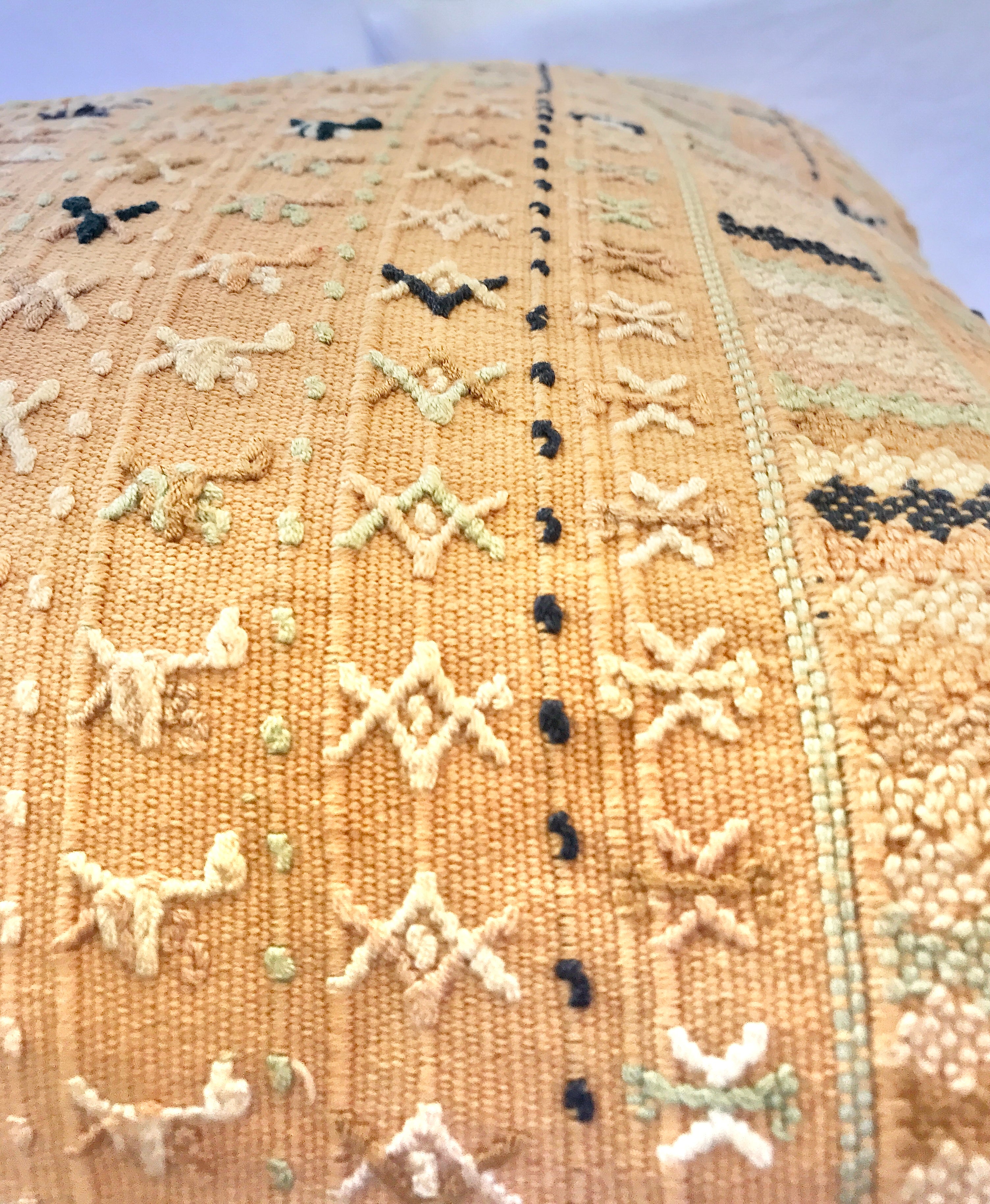Vintage textile pillows made from a Guatemalan huipil and corte.
