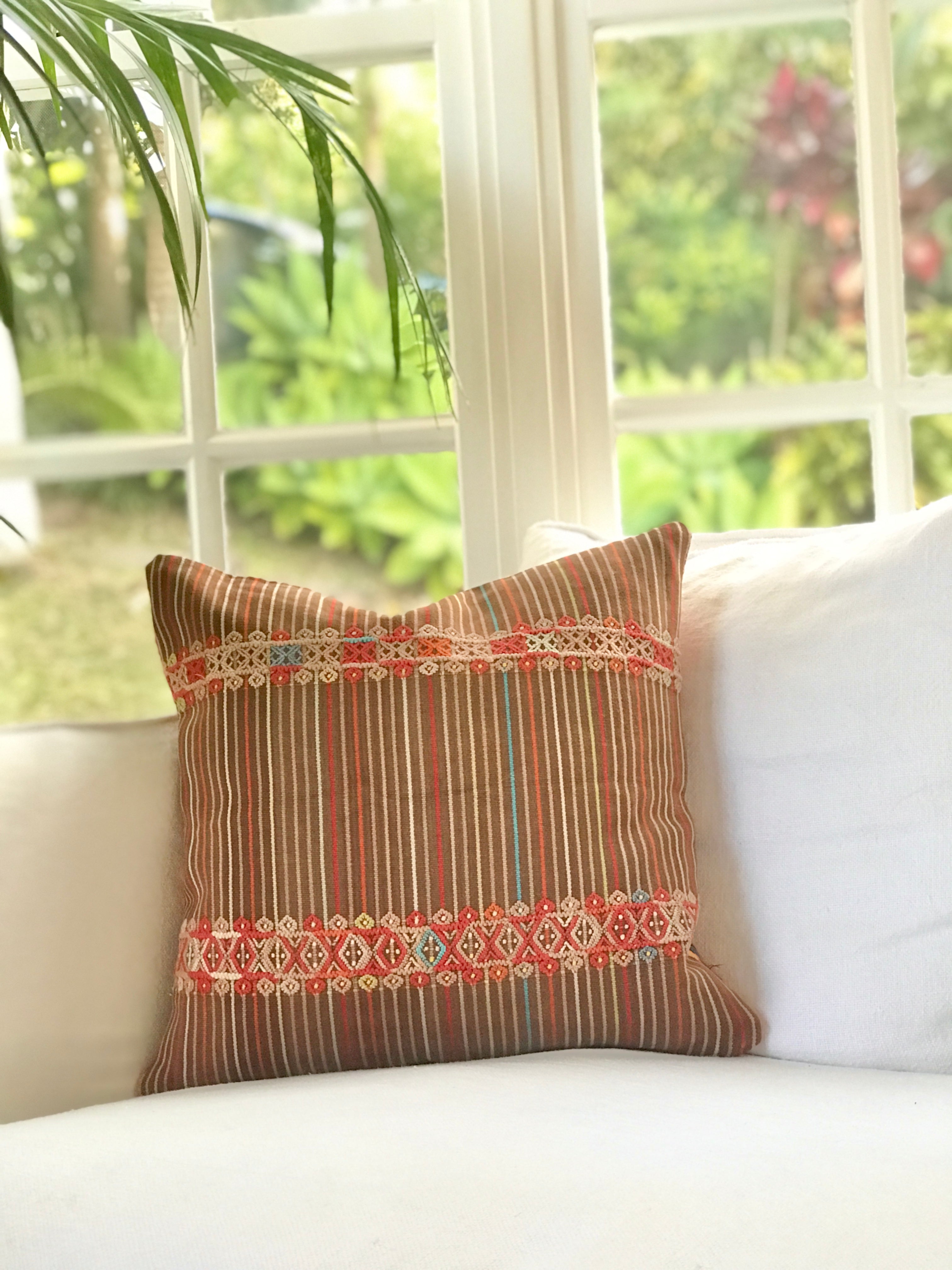 Vintage textile cushions made from a Guatemalan huipil and corte.