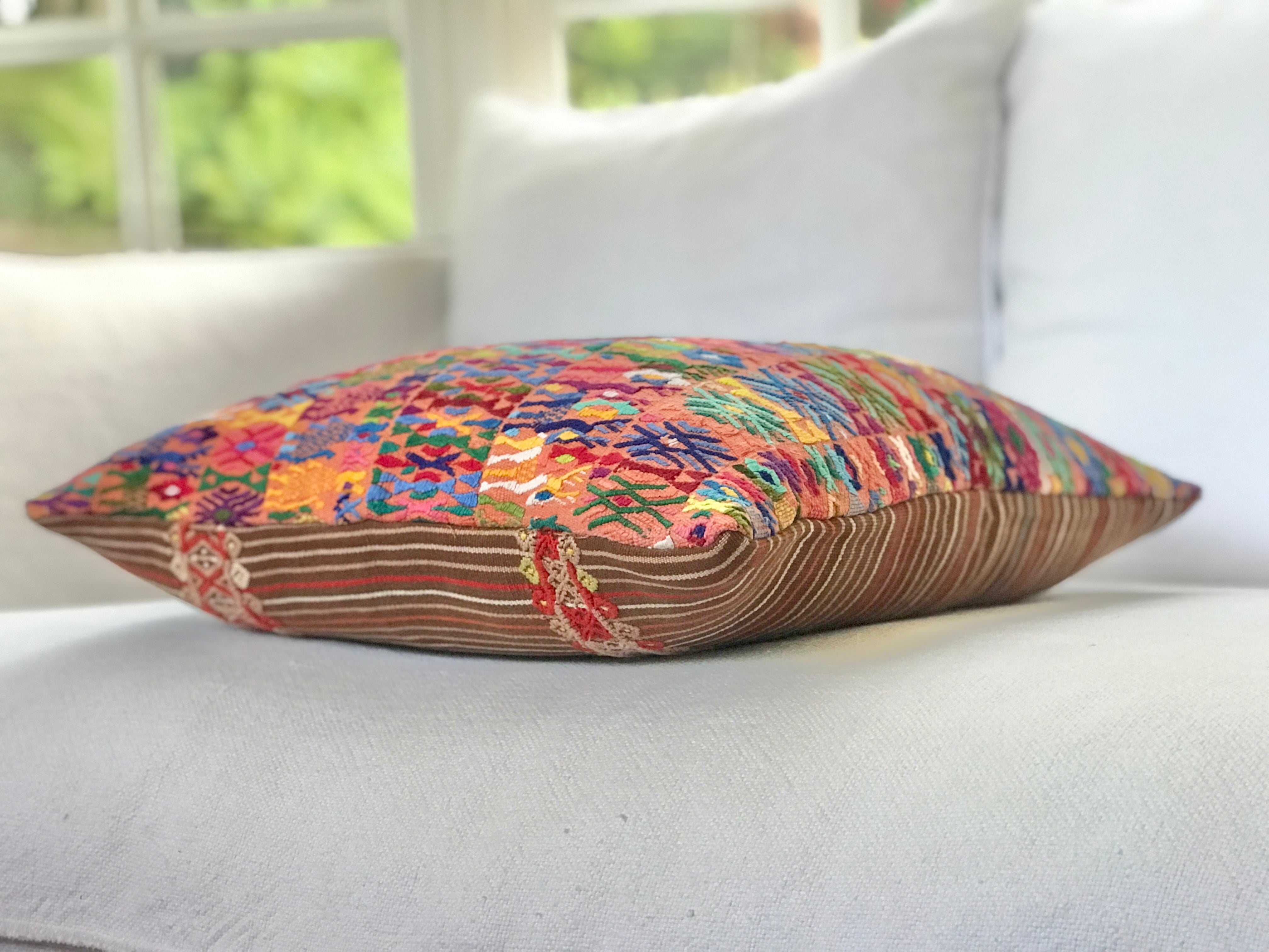 Vintage textile cushions made from a Guatemalan huipil and corte.
