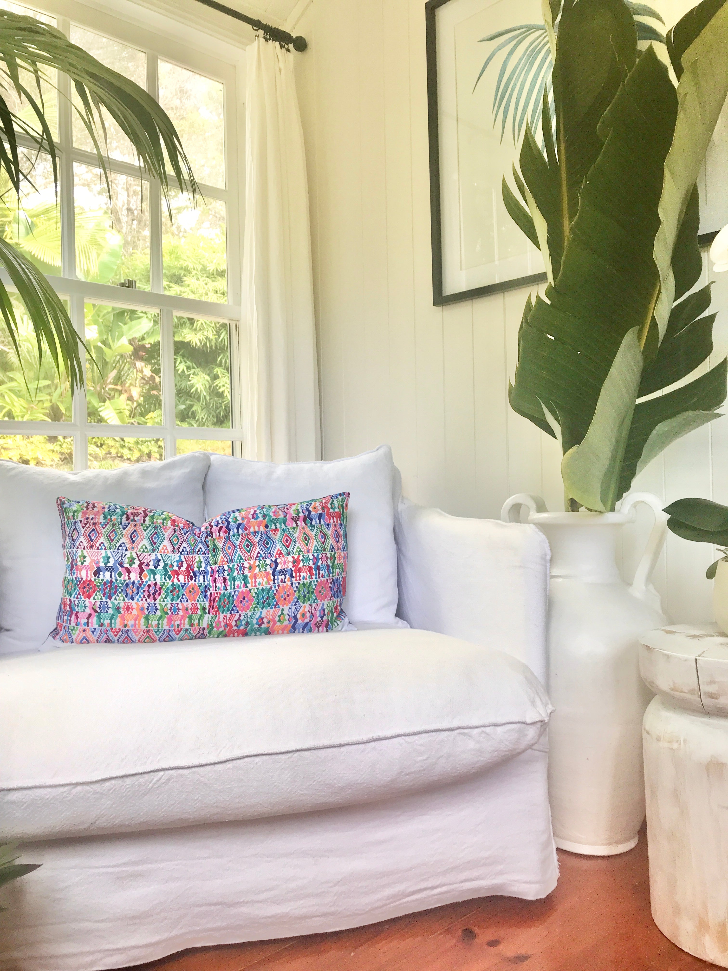 Vintage textile cushions made from a Guatemalan huipil and corte.