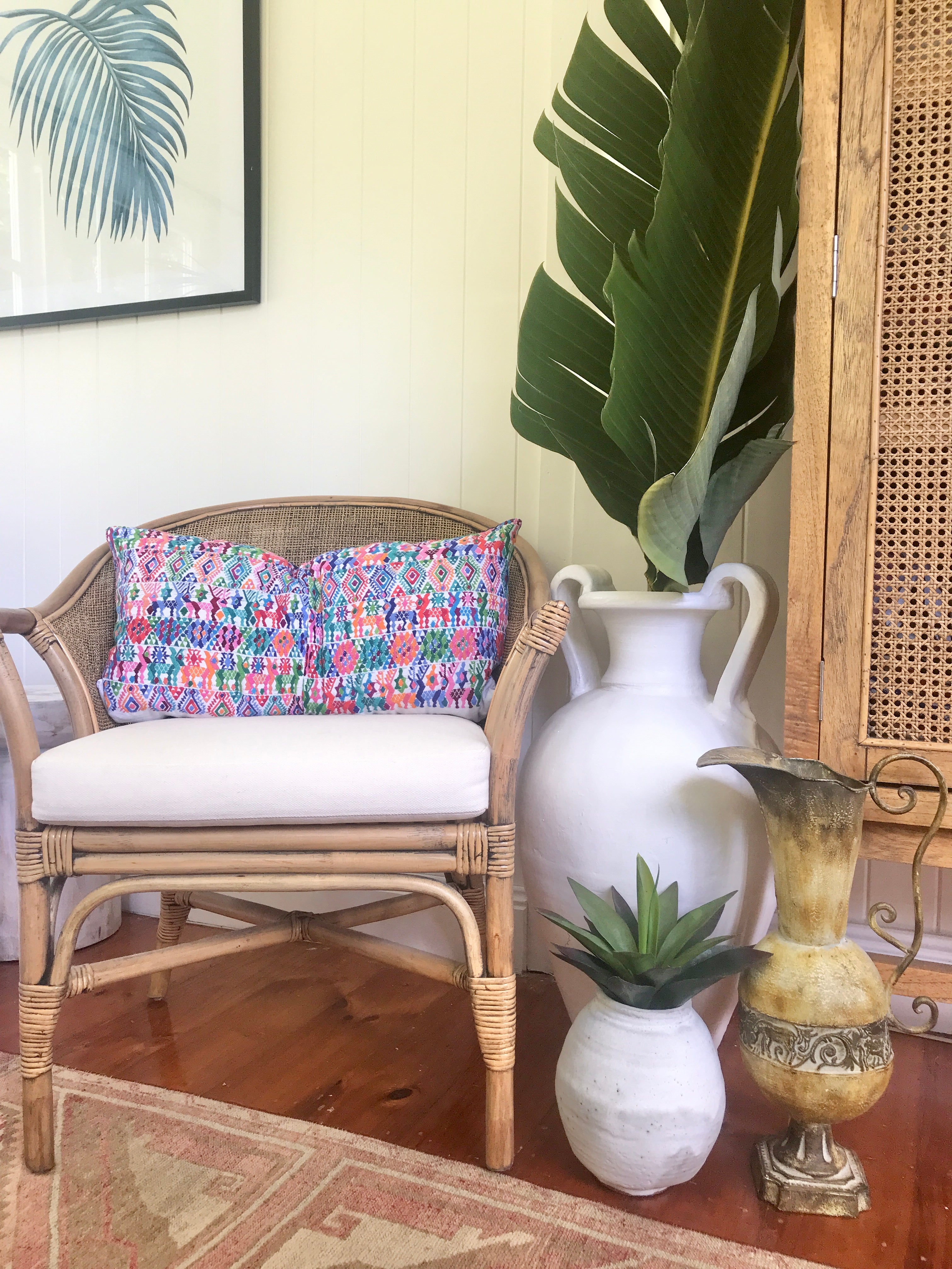 Vintage textile cushions made from a Guatemalan huipil and corte.