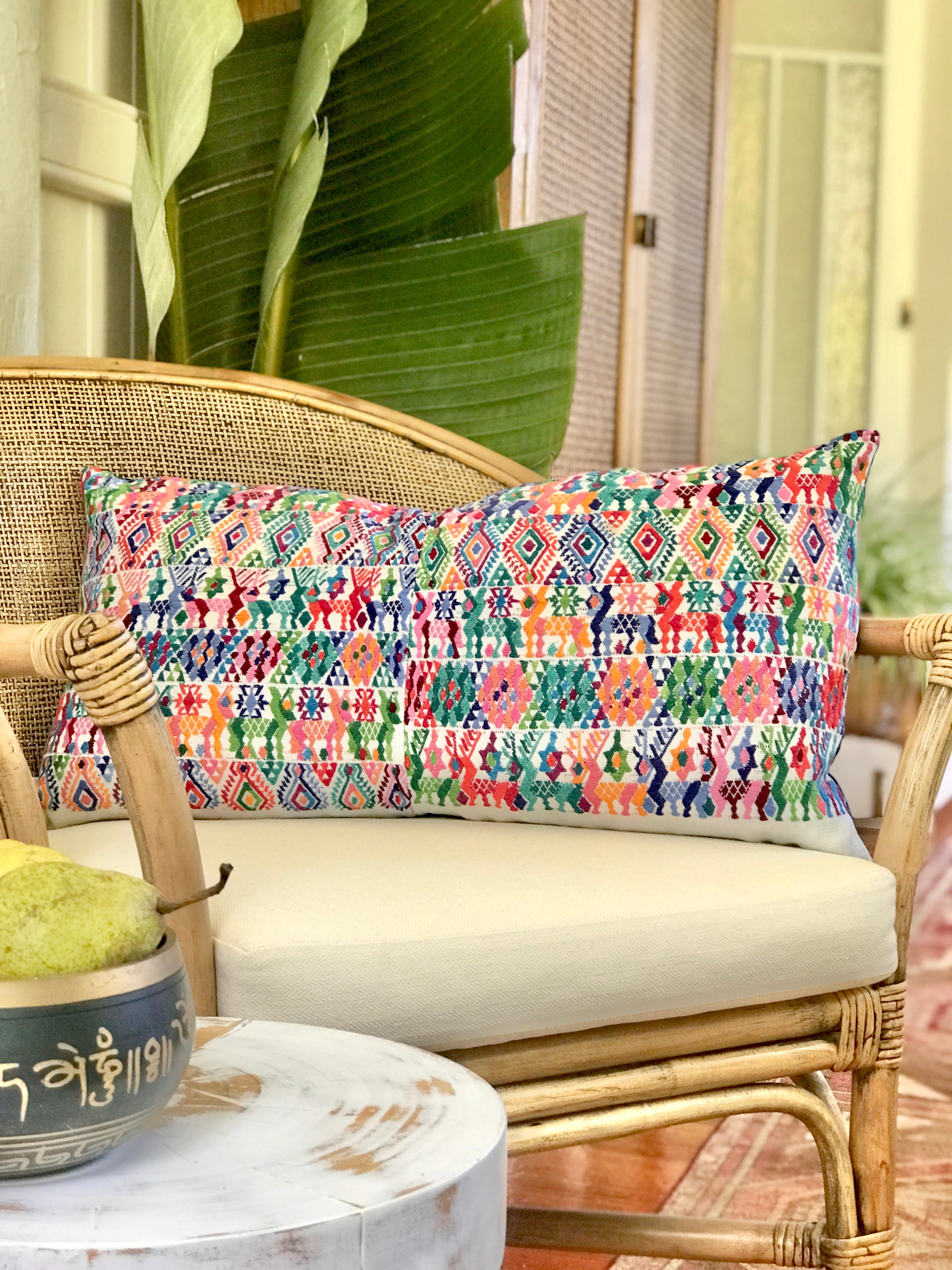 Vintage textile cushions made from a Guatemalan huipil and corte.