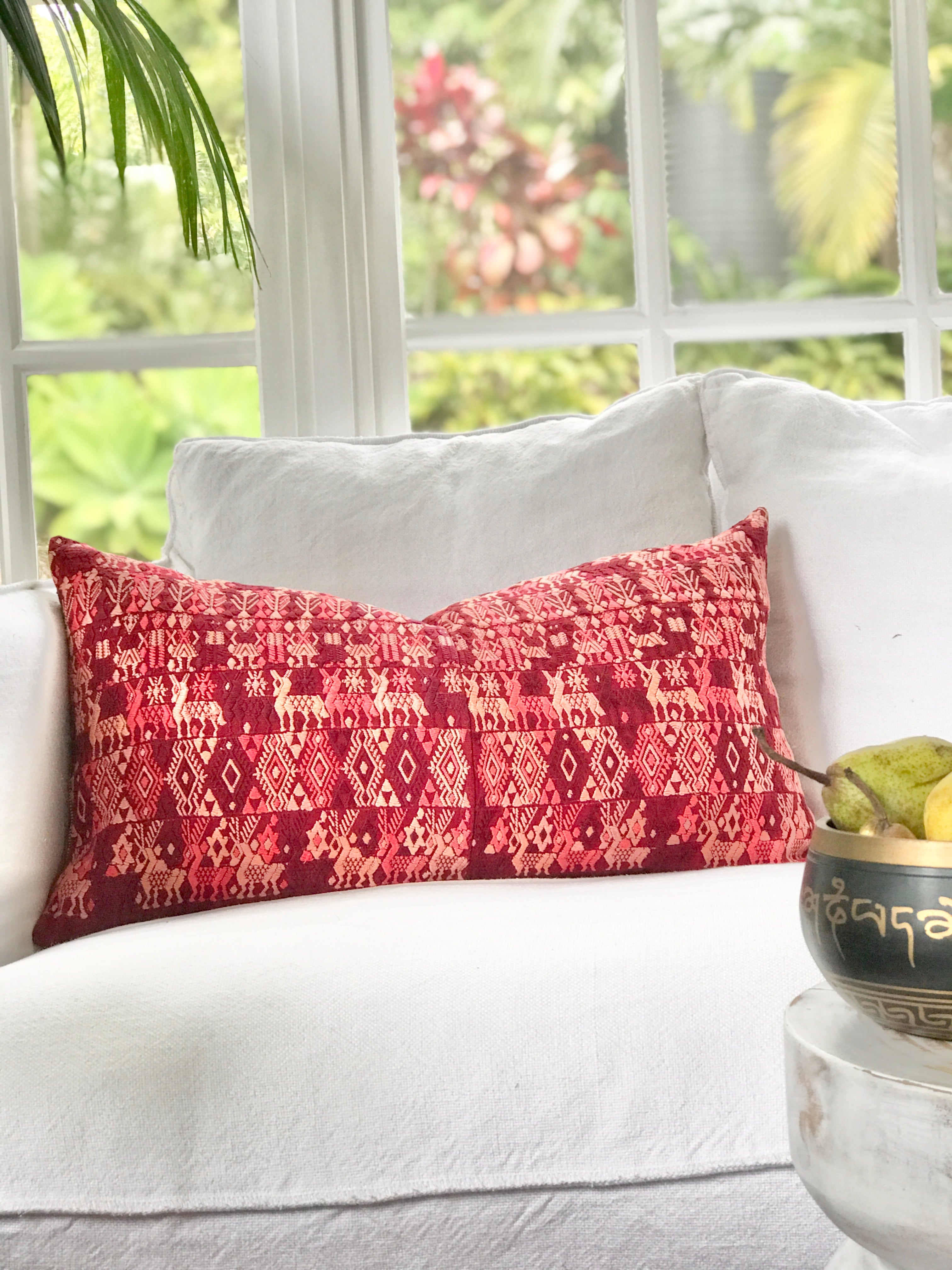 Vintage textile cushions made from a Guatemalan huipil and corte.