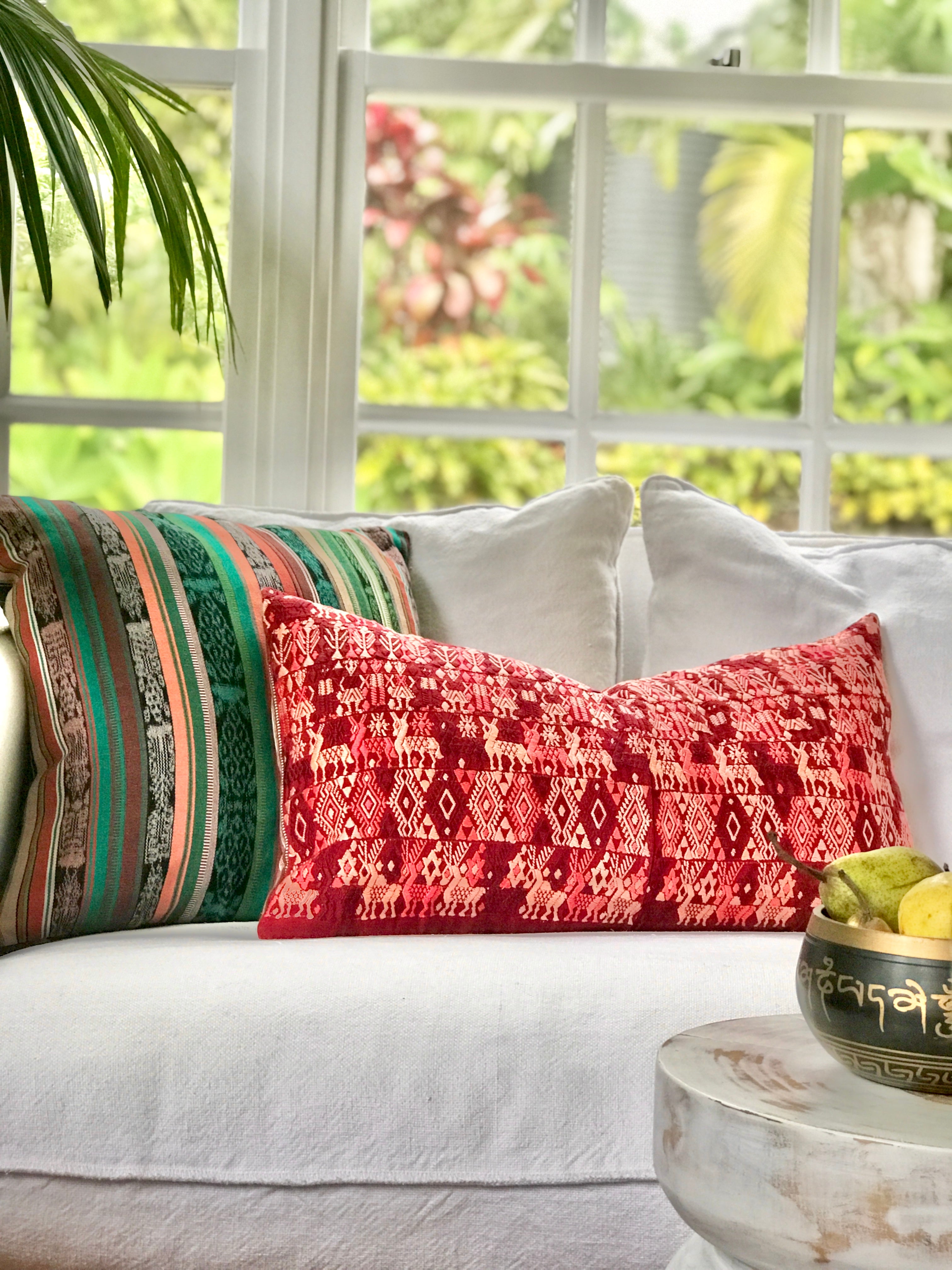 Vintage textile cushions made from a Guatemalan huipil and corte.
