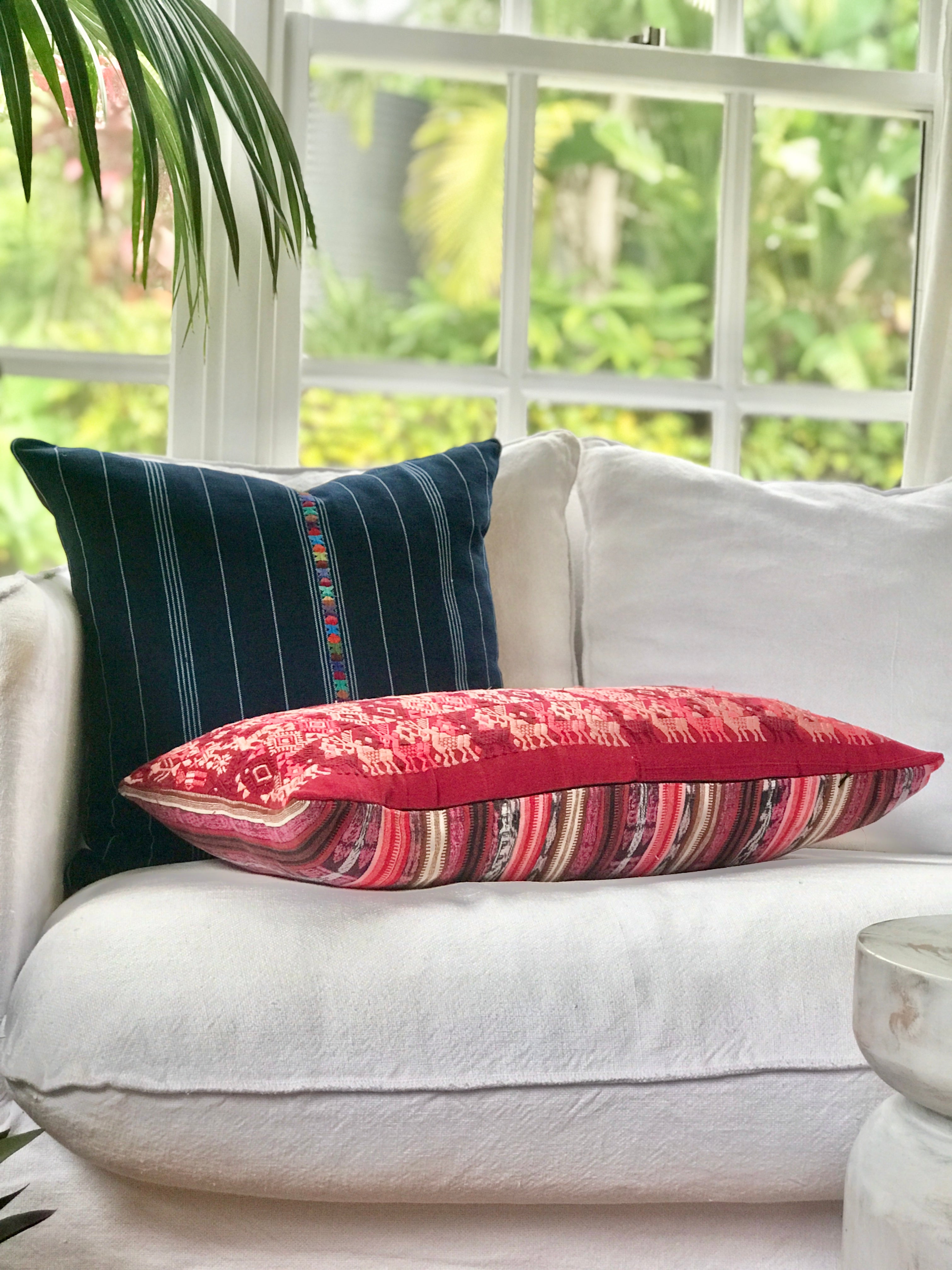 Vintage textile cushions made from a Guatemalan huipil and corte.