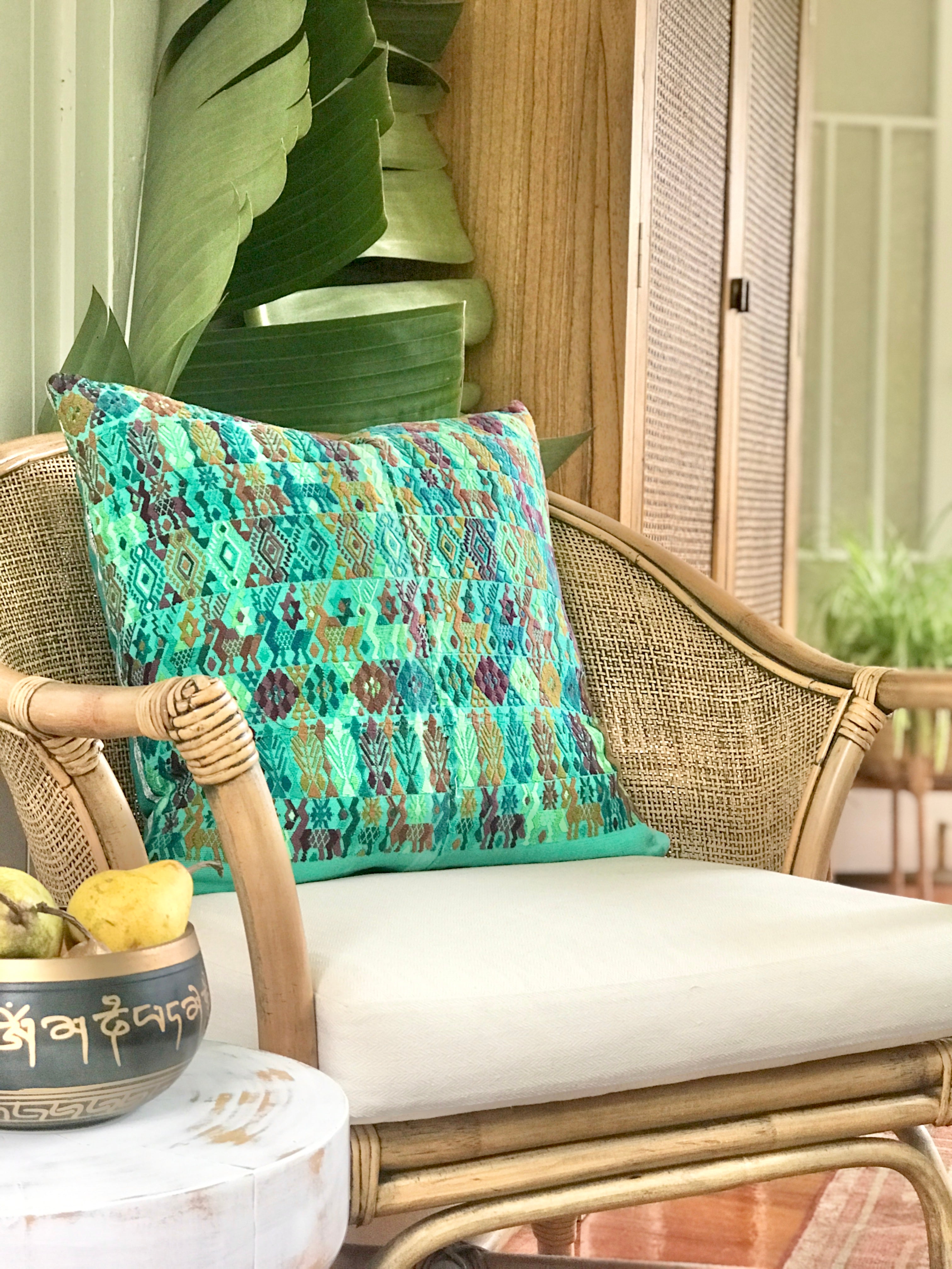 Vintage textile cushions made from a Guatemalan huipil and corte.