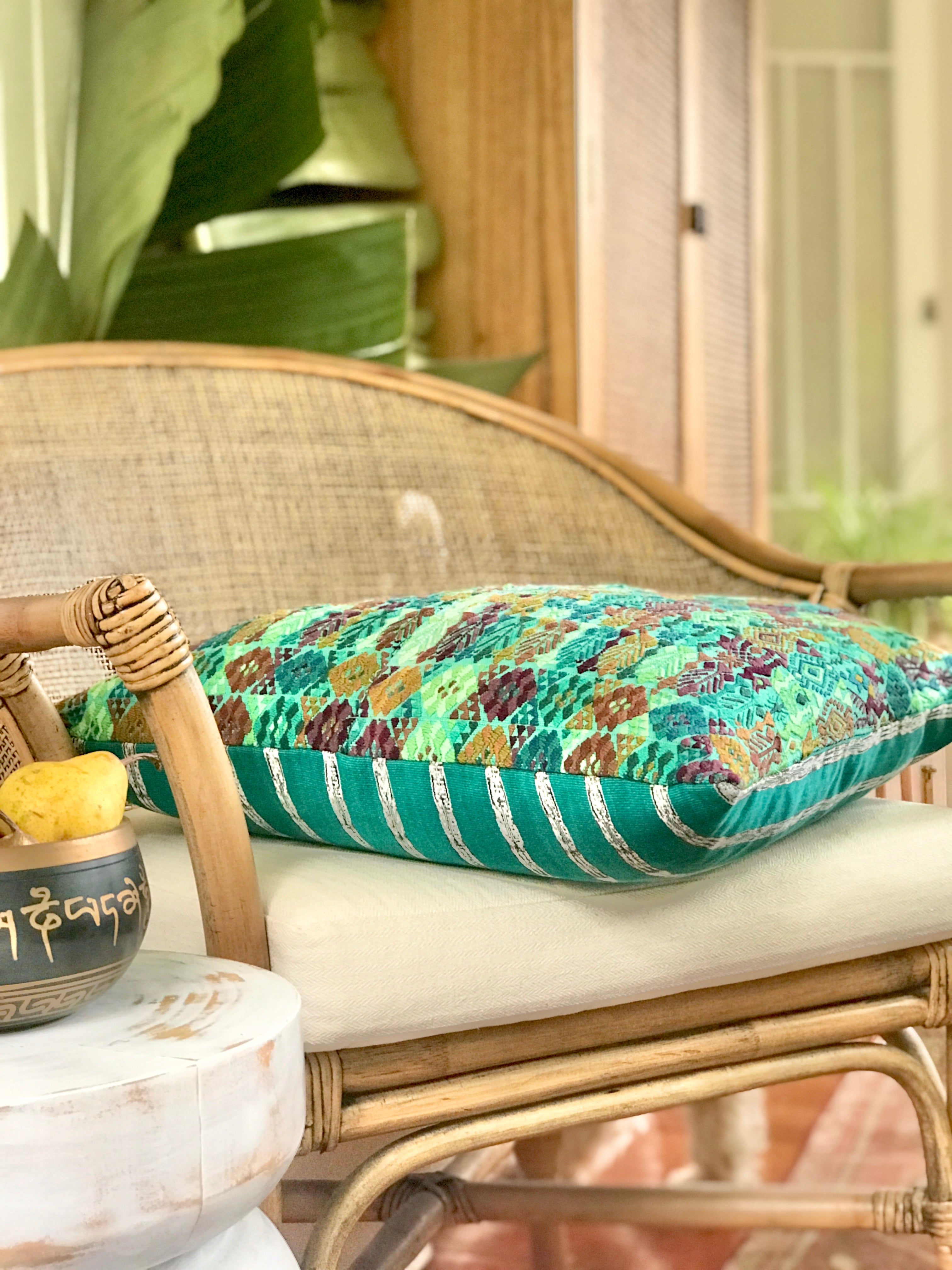 Vintage textile cushions made from a Guatemalan huipil and corte.