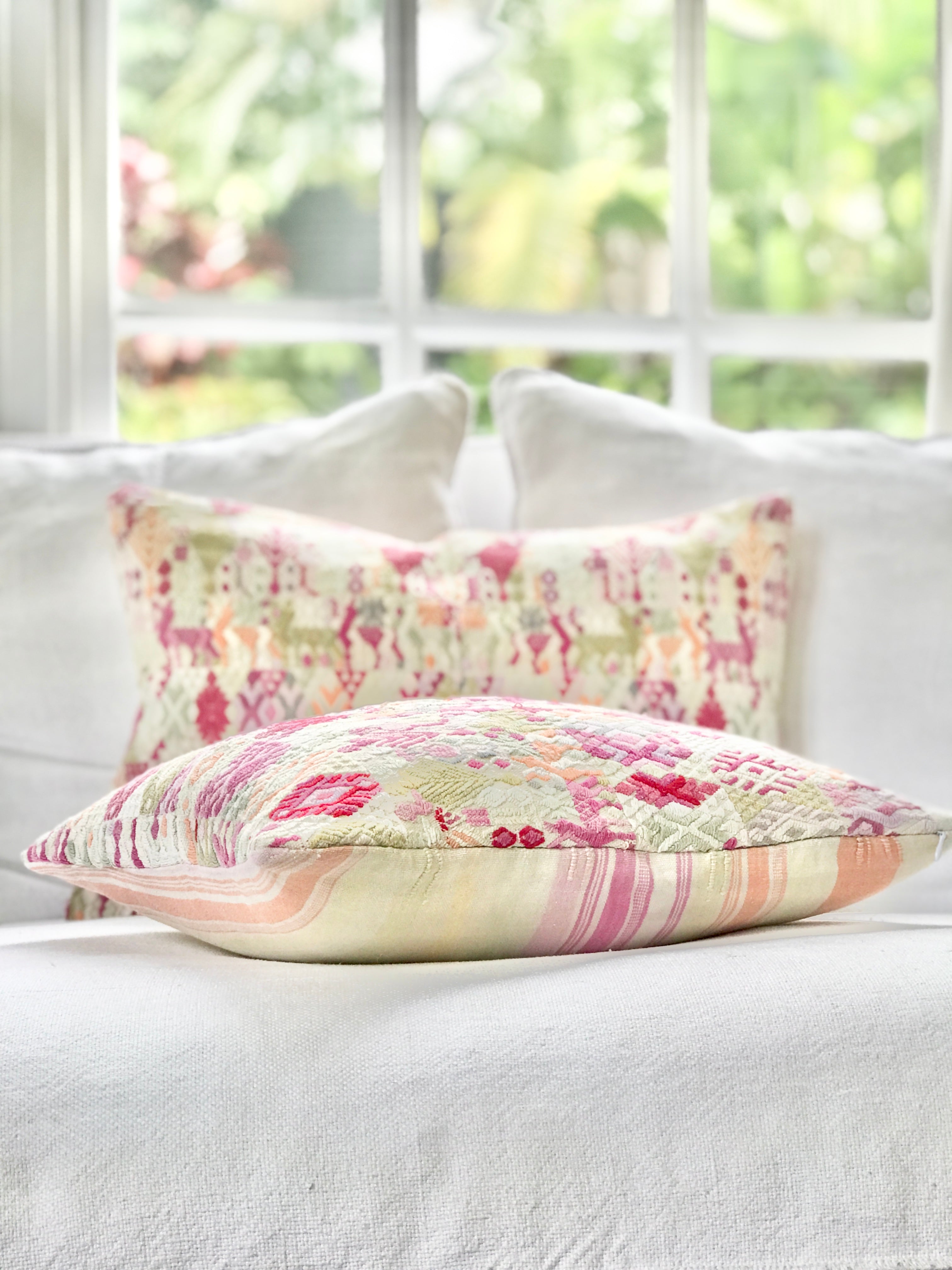 Vintage textile cushions made from a Guatemalan huipil and corte.