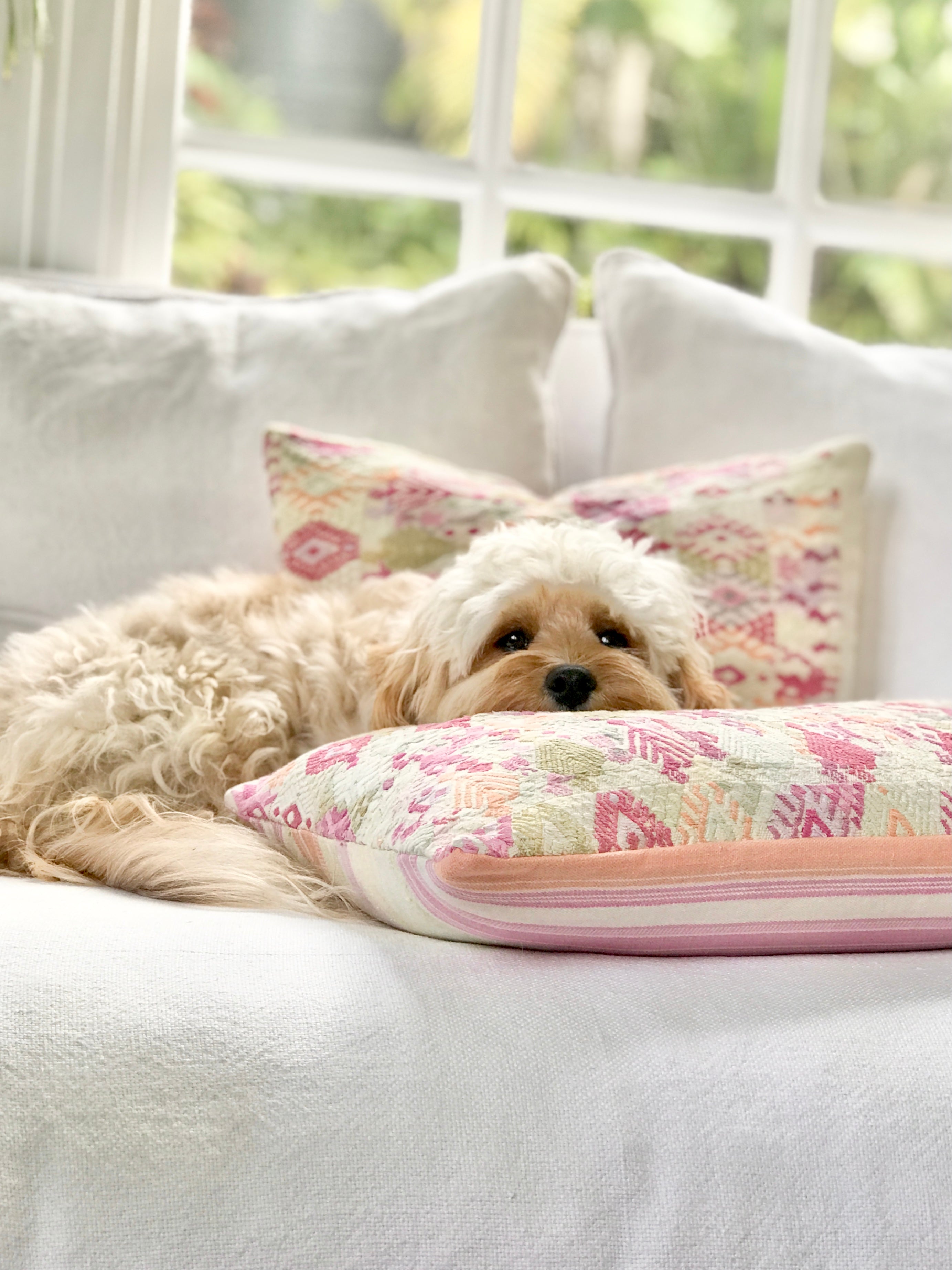 Vintage textile cushions made from a Guatemalan huipil and corte.
