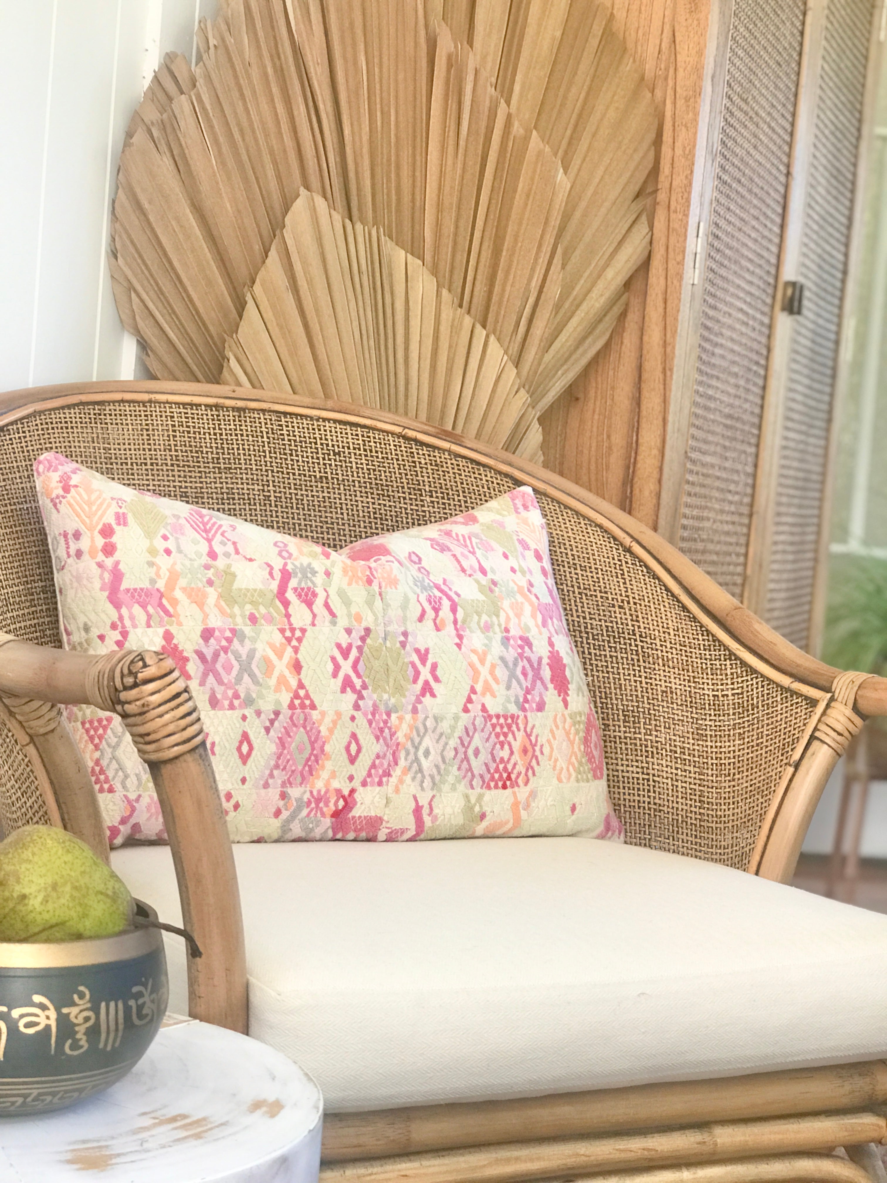 Vintage textile cushions made from a Guatemalan huipil and corte.