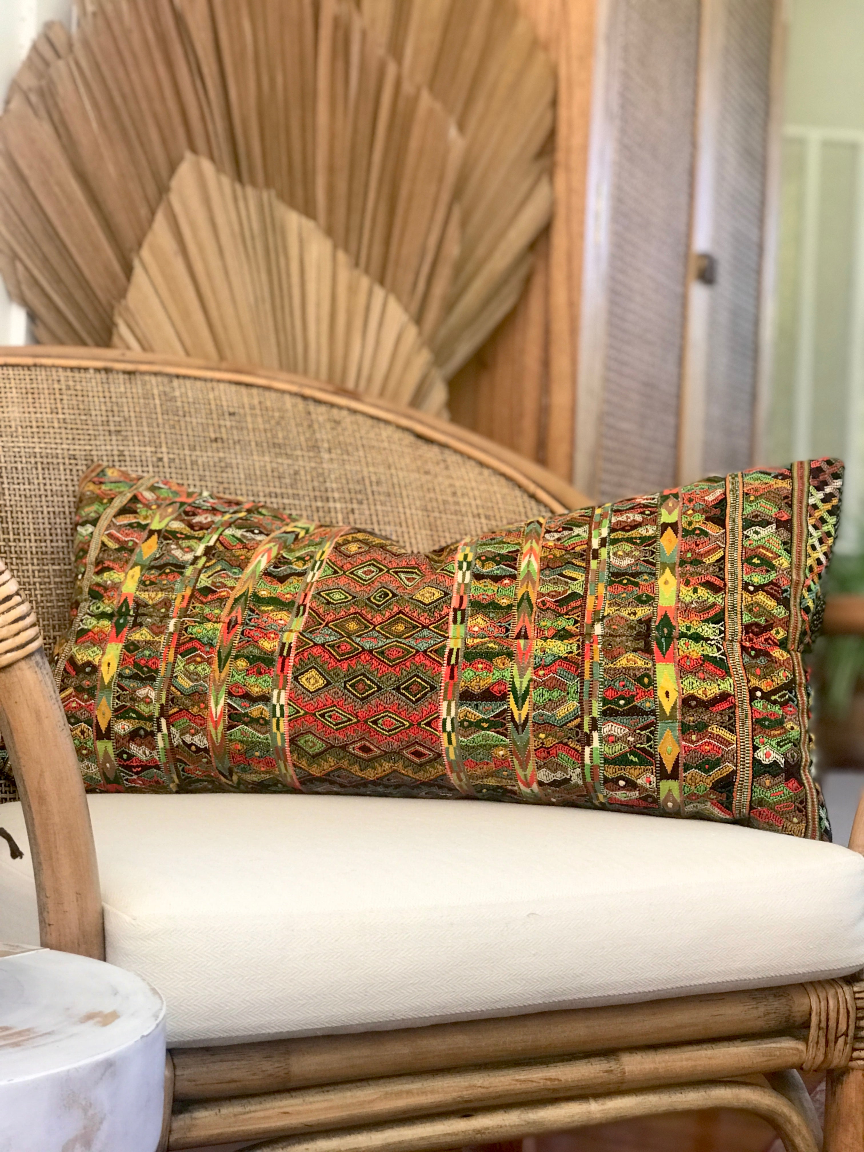 Vintage textile pillows made from a Guatemalan huipil and corte.
