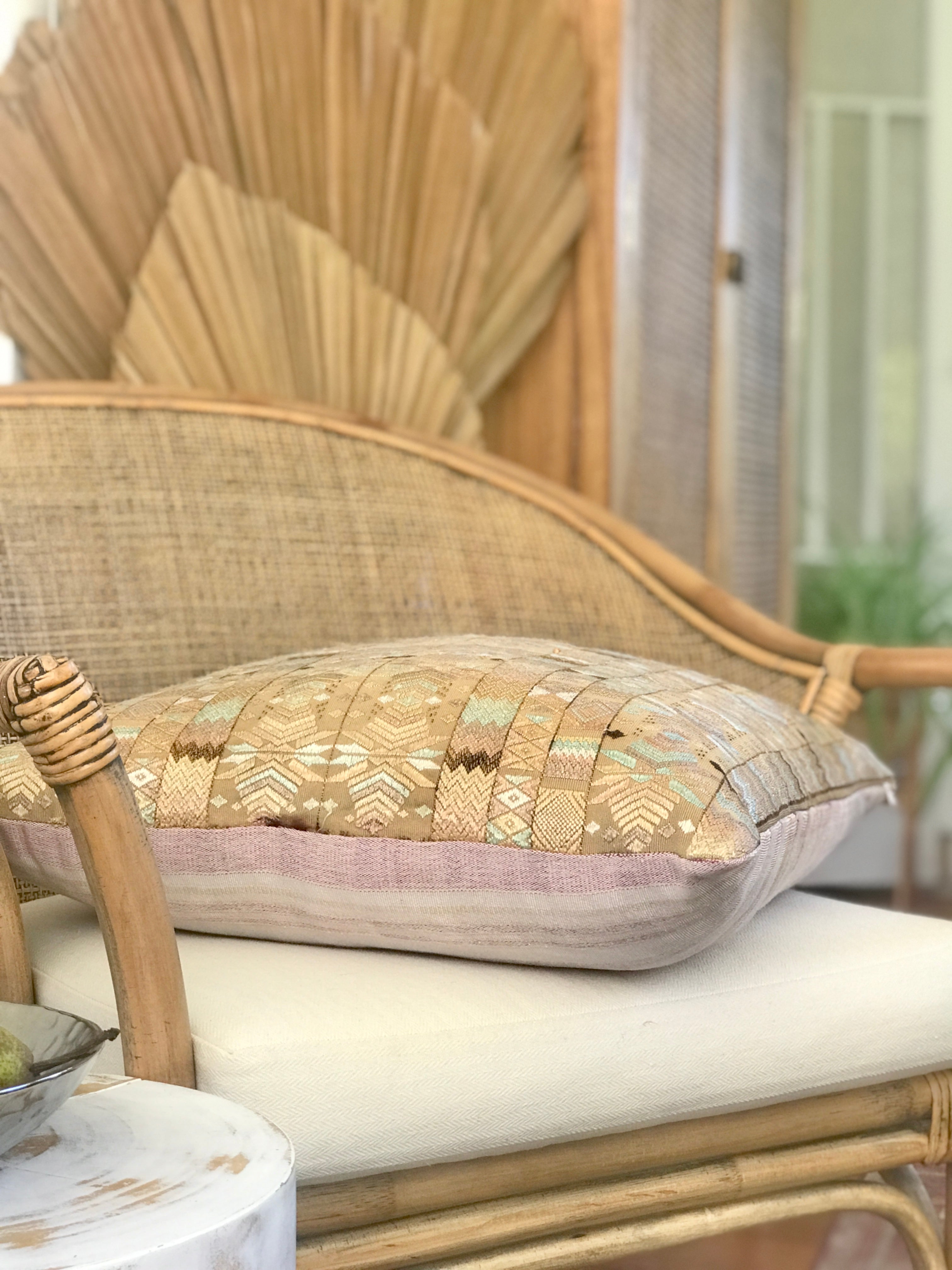 Vintage textile pillows made from a Guatemalan huipil and corte.