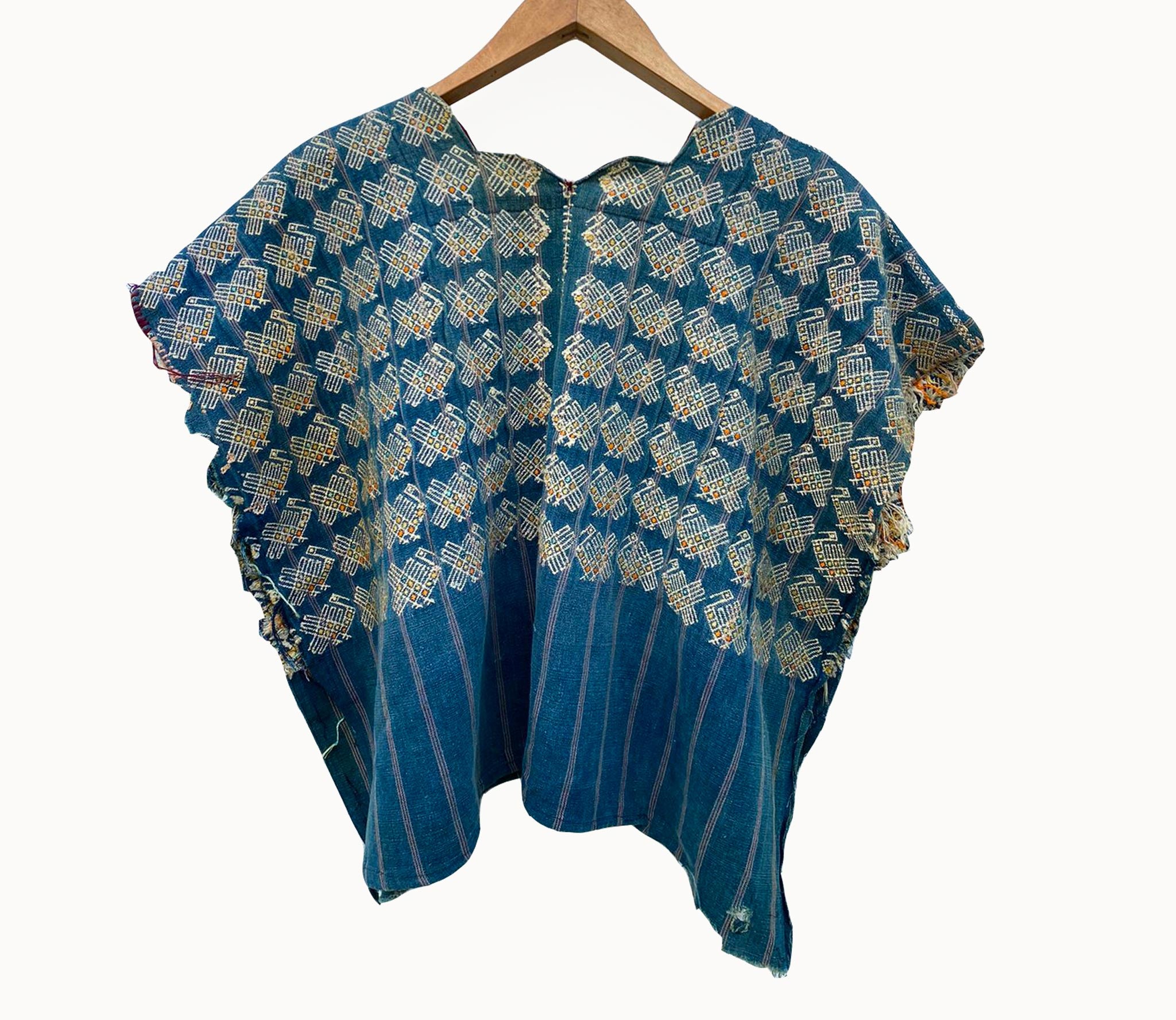 Vintage textile cushion made from a Guatemalan huipil and corte