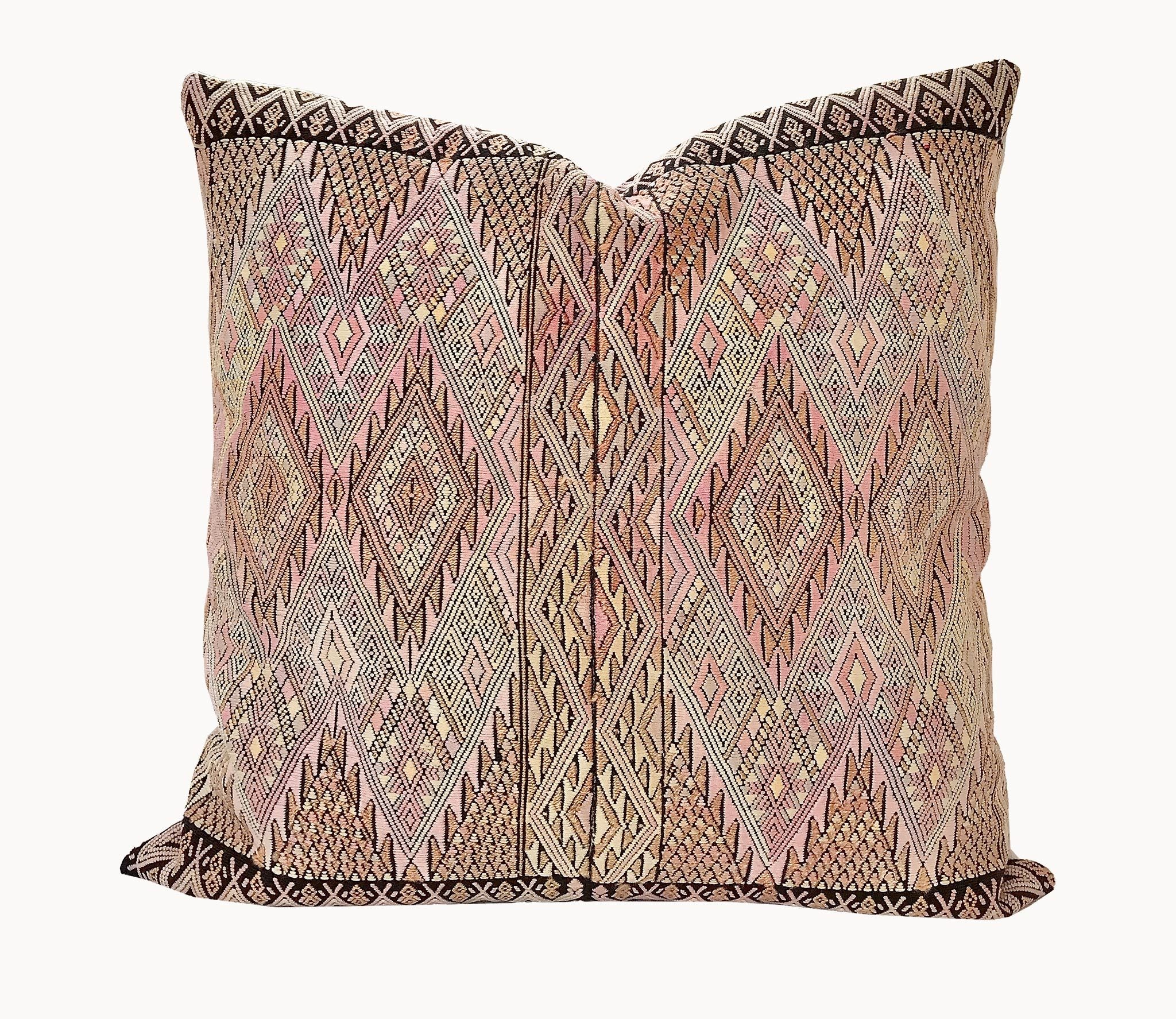 Guatemalan embroidered huipil pillow. Geometric chevron pattern in a pale pink palette.