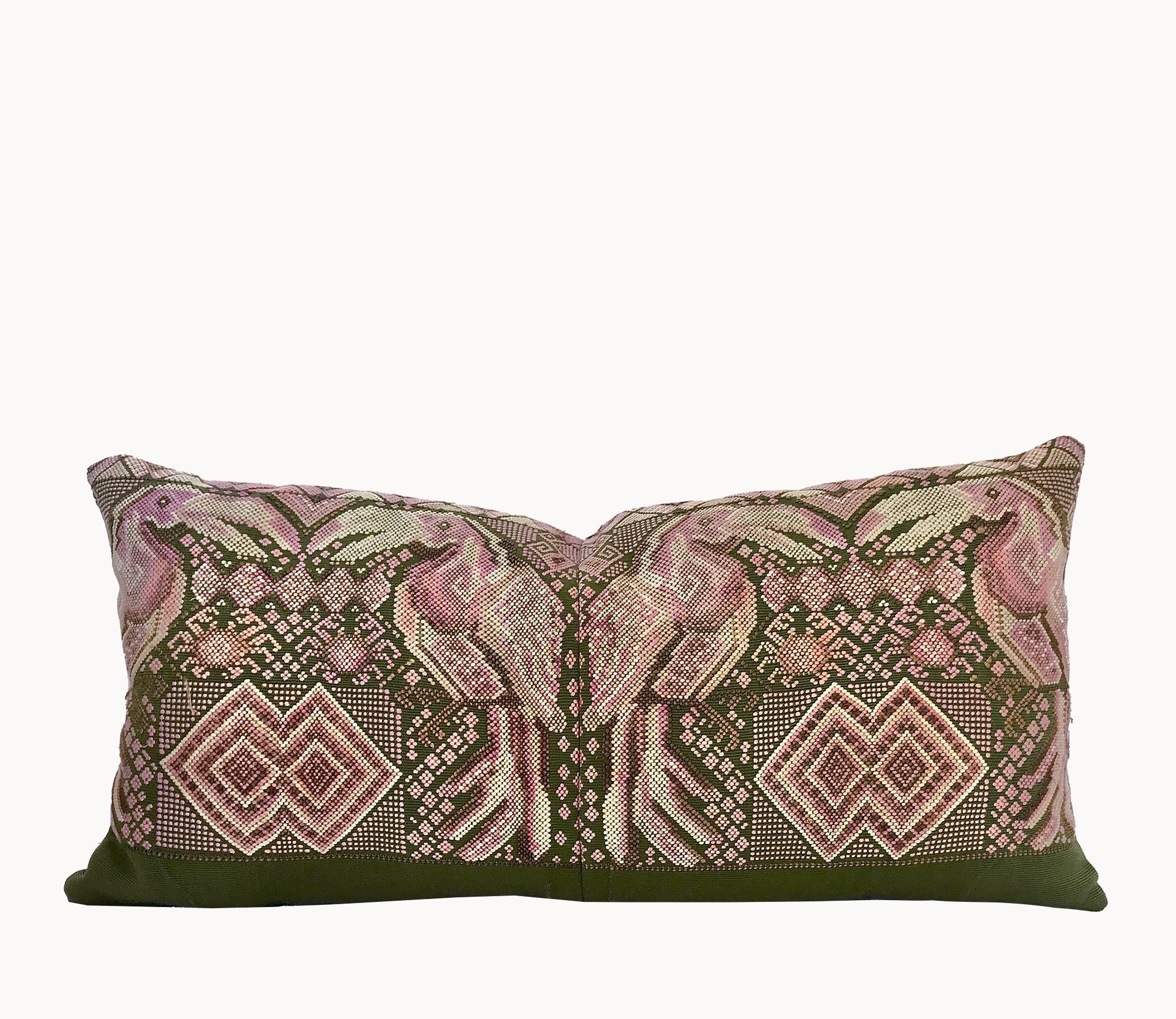 Guatemalan embroidered huipil pillow. Maximilist design of kissing toucan birds and tribal symbols for bohemian decor