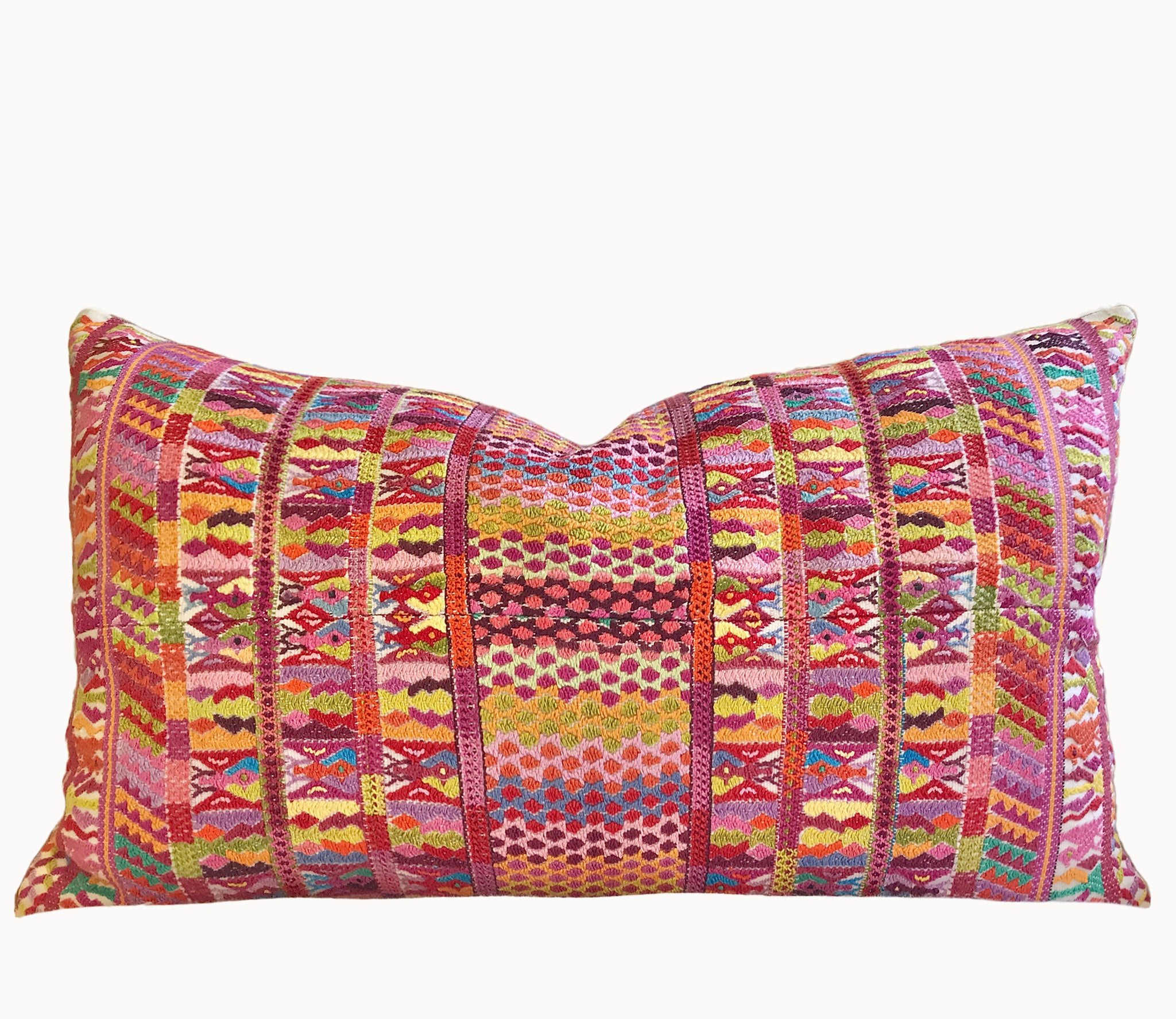 Vintage textile pillows made from a Guatemalan huipil and corte.
