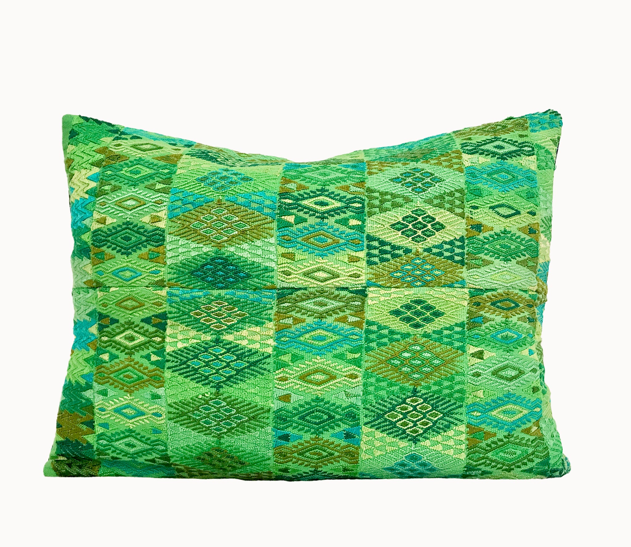 Vintage textile pillows made from a Guatemalan huipil and corte