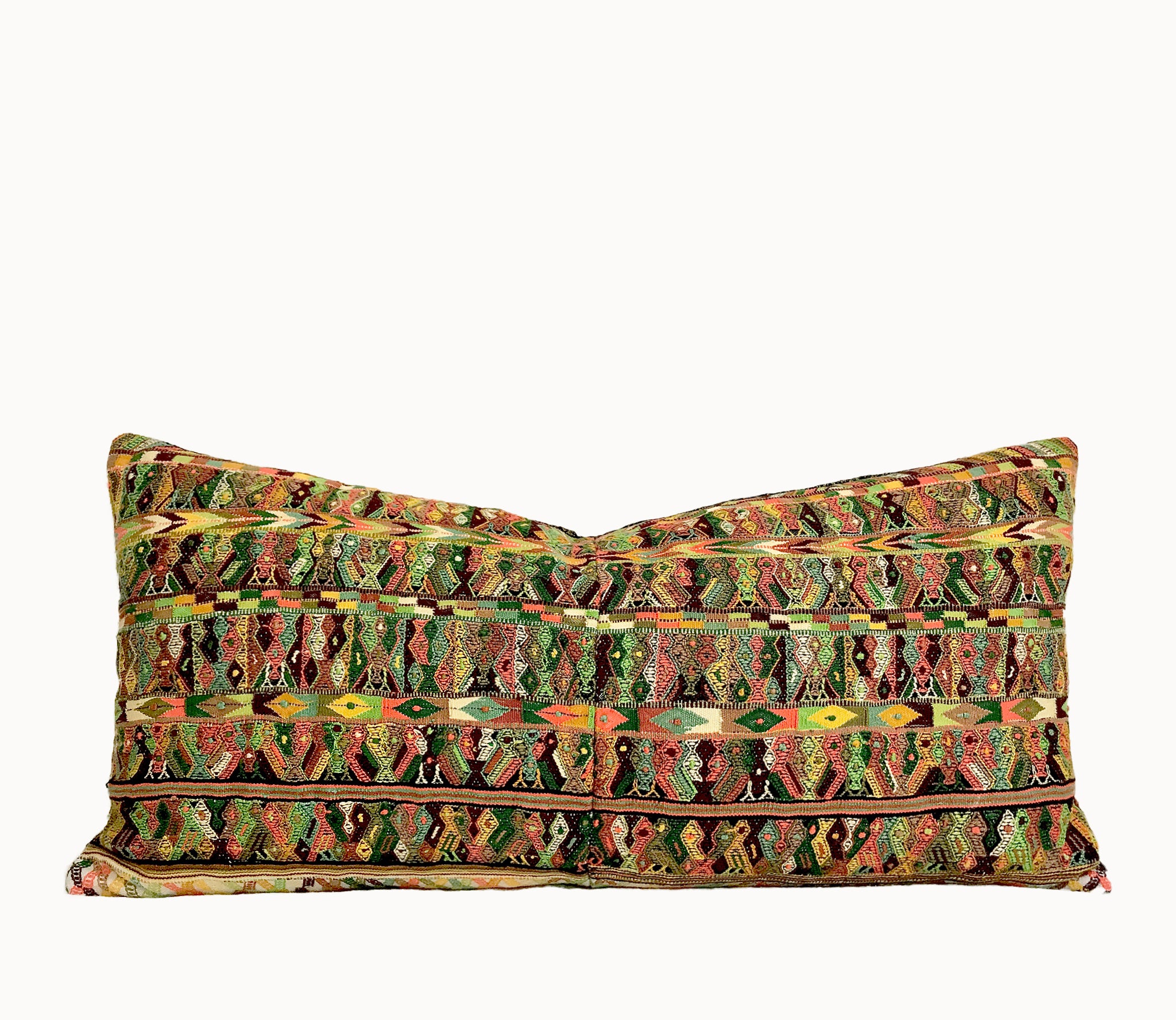 Vintage textile cushions made from a Guatemalan huipil and corte.