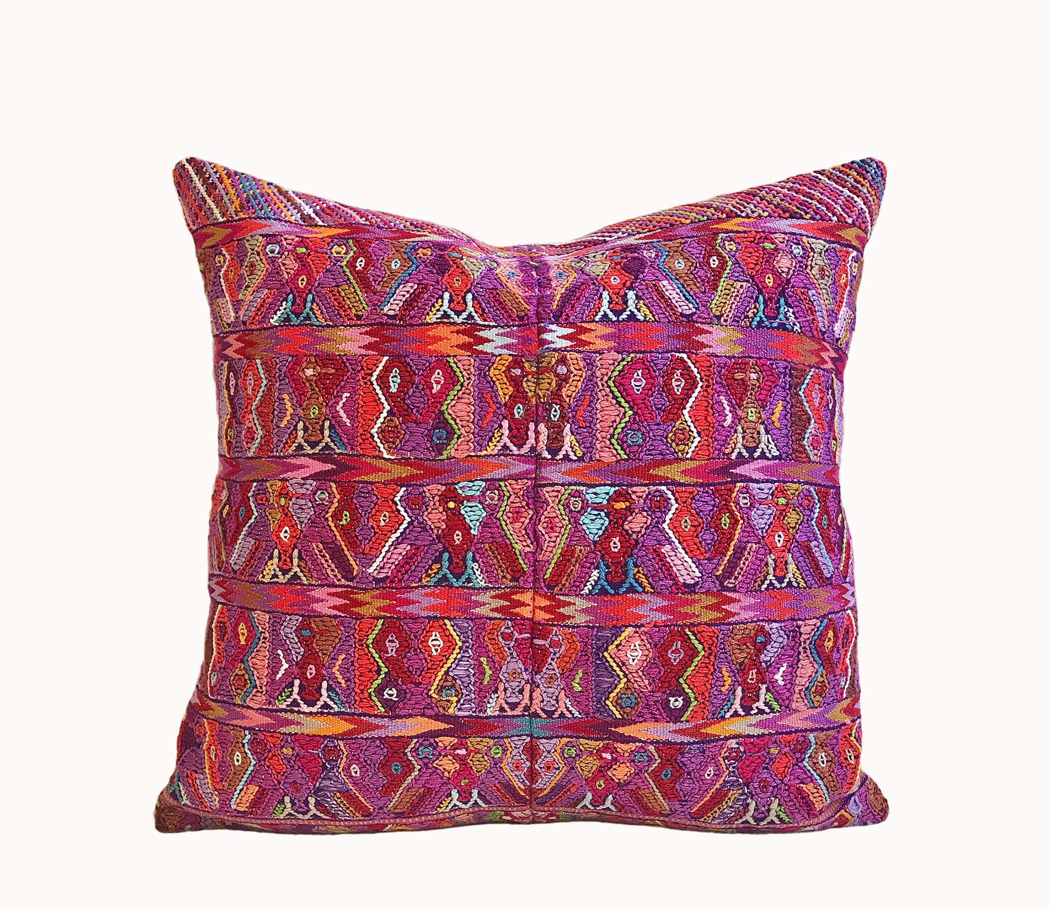 Vintage textile pillows made from a Guatemalan huipil and corte.