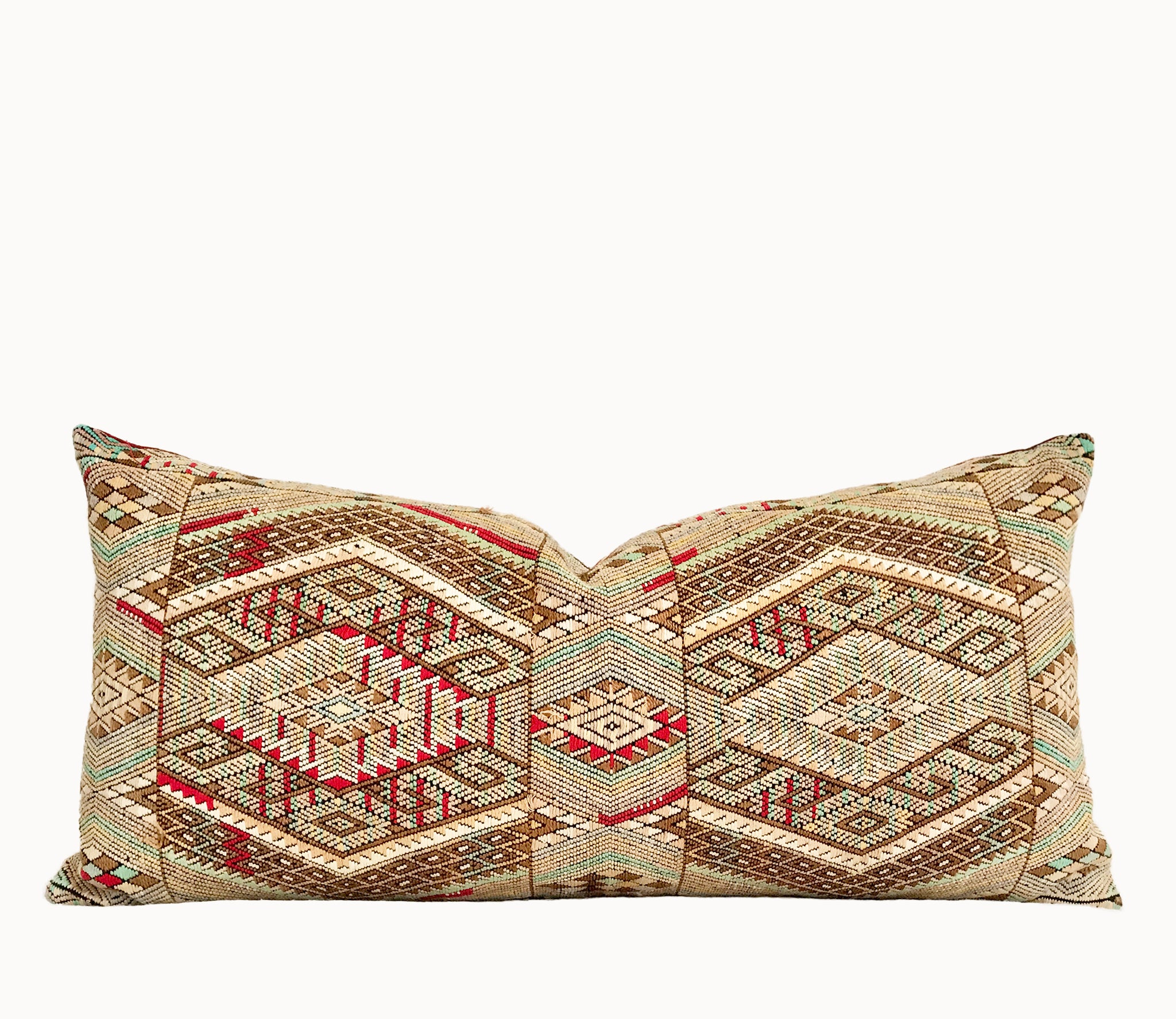 Vintage textile pillows made from a Guatemalan huipil and corte