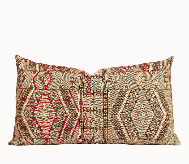 Vintage textile pillows made from a Guatemalan huipil and corte