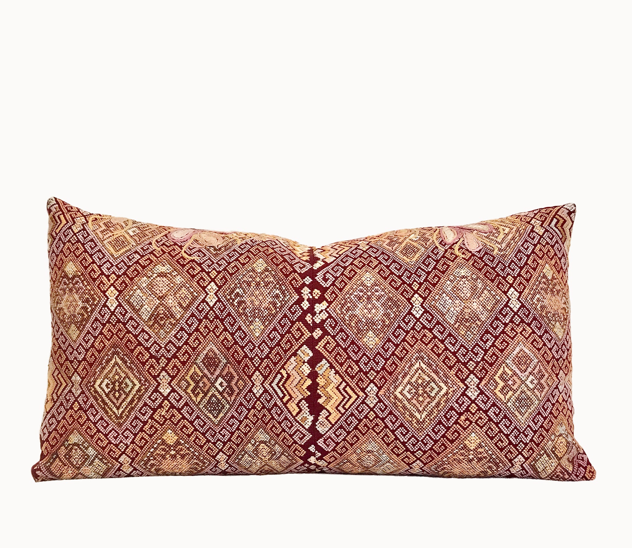 Vintage textile pillows made from a Guatemalan huipil and corte