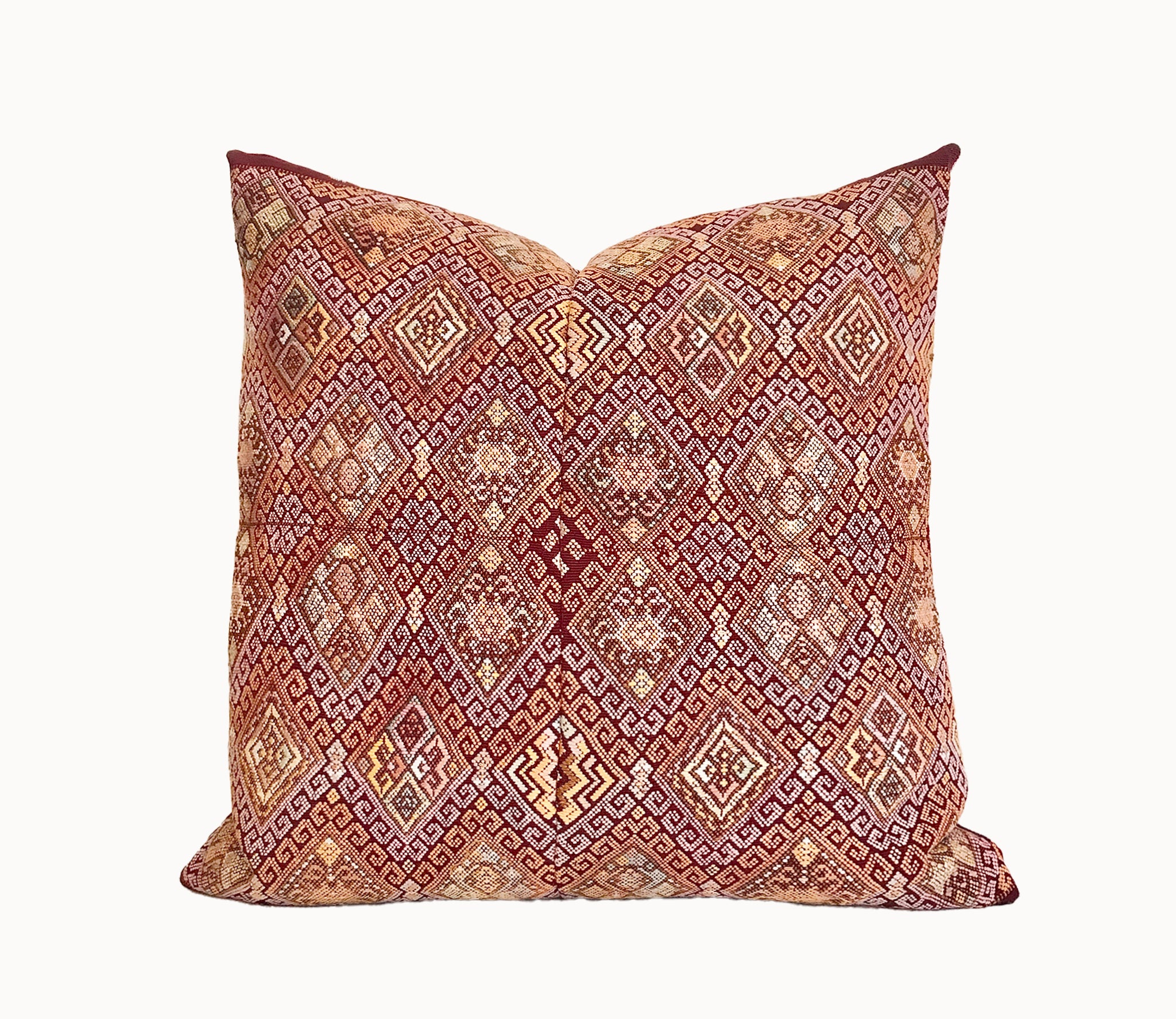 Vintage textile pillows made from a Guatemalan huipil and corte