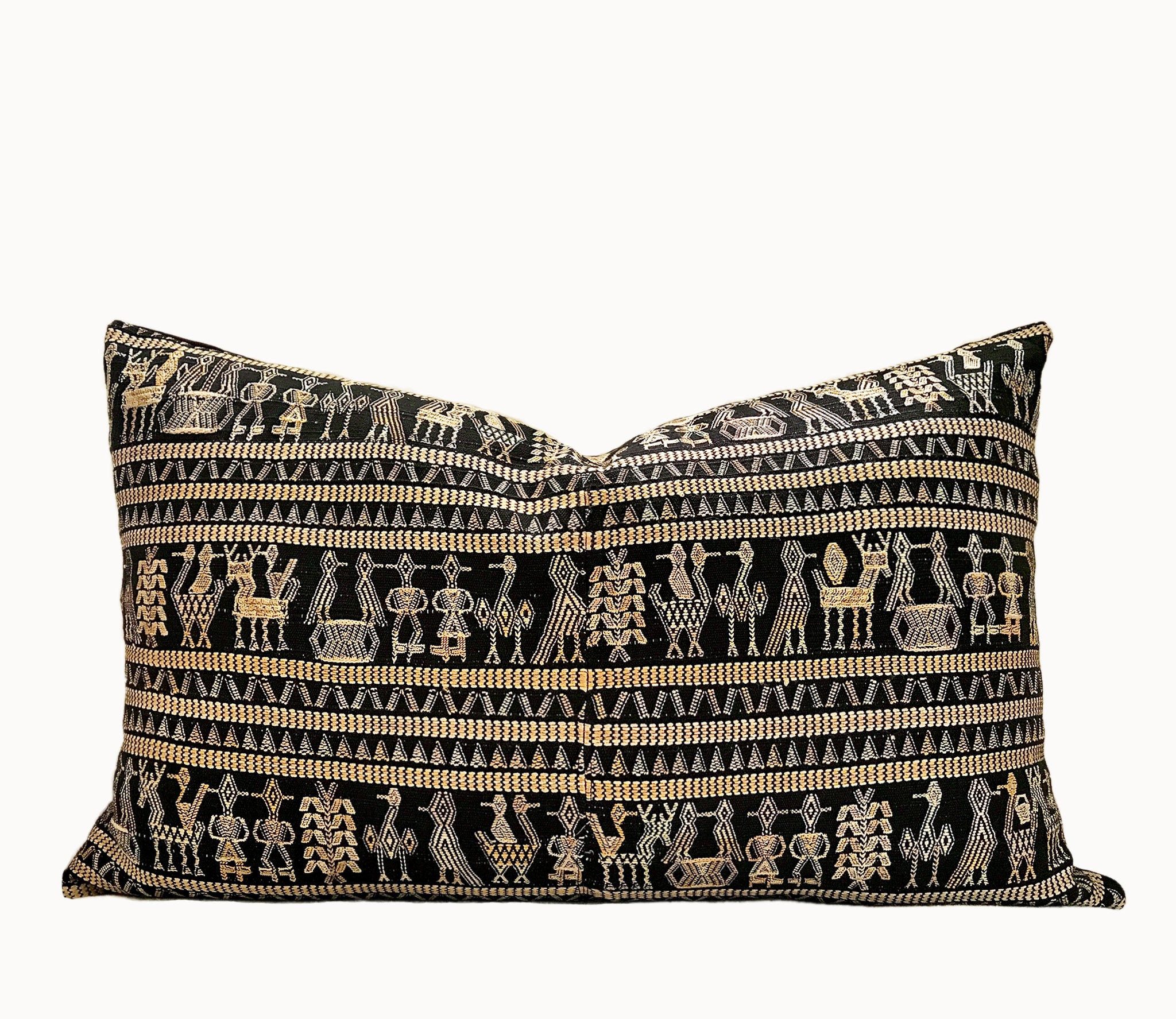 Vintage textile pillows made from a Guatemalan huipil and corte