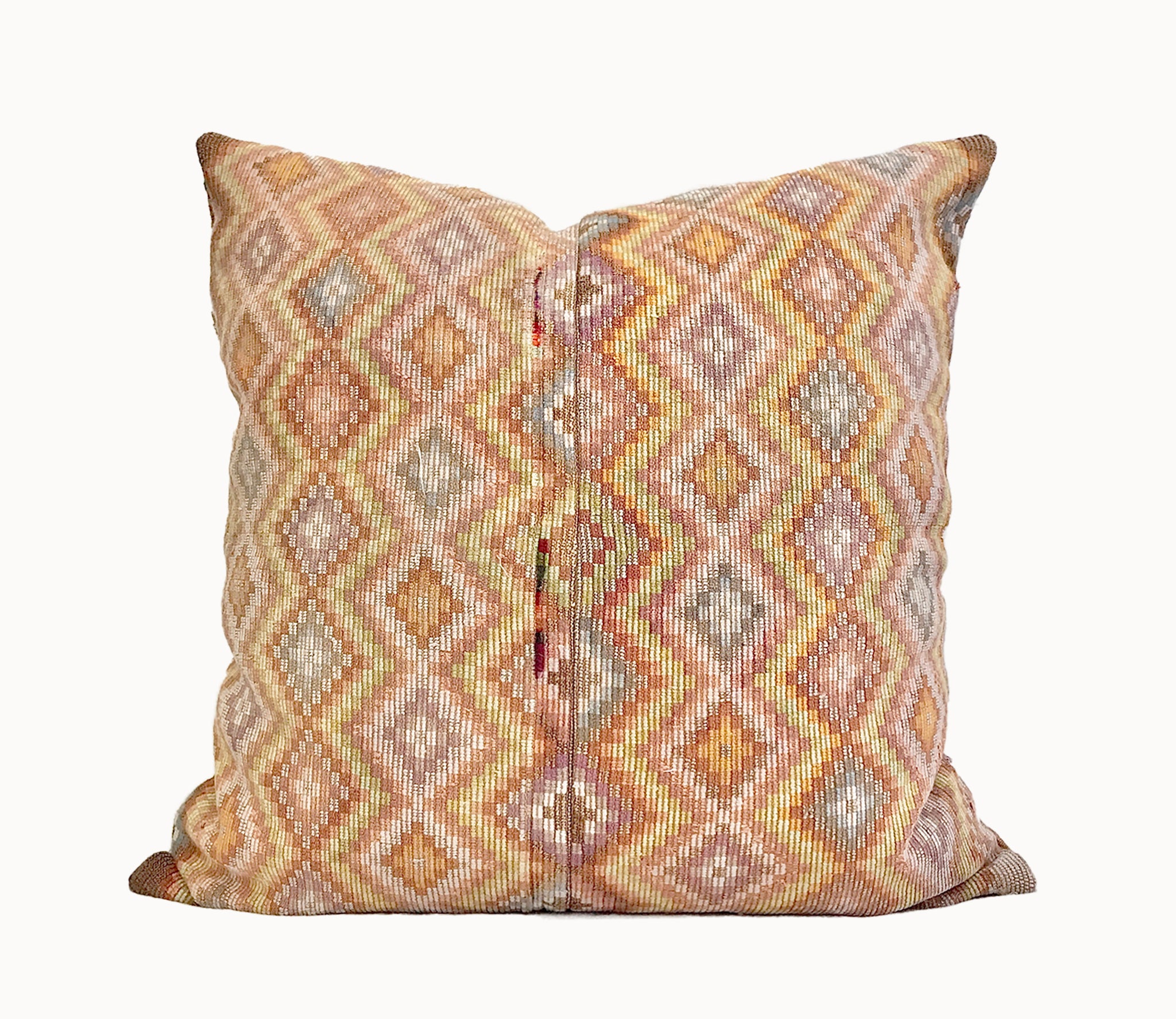 Vintage textile pillows made from a Guatemalan huipil and corte