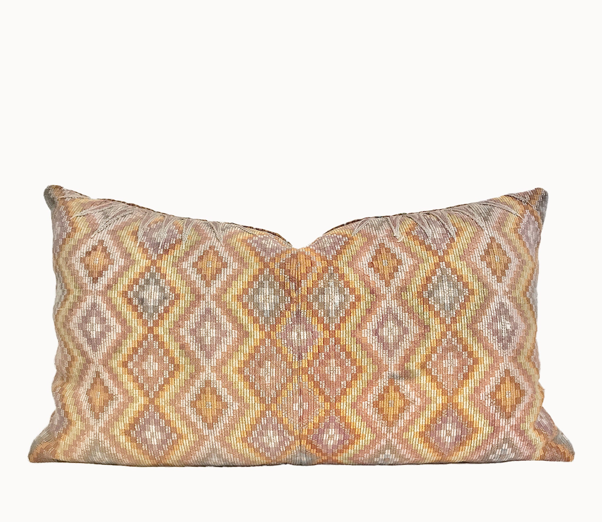 Vintage textile pillows made from a Guatemalan huipil and corte
