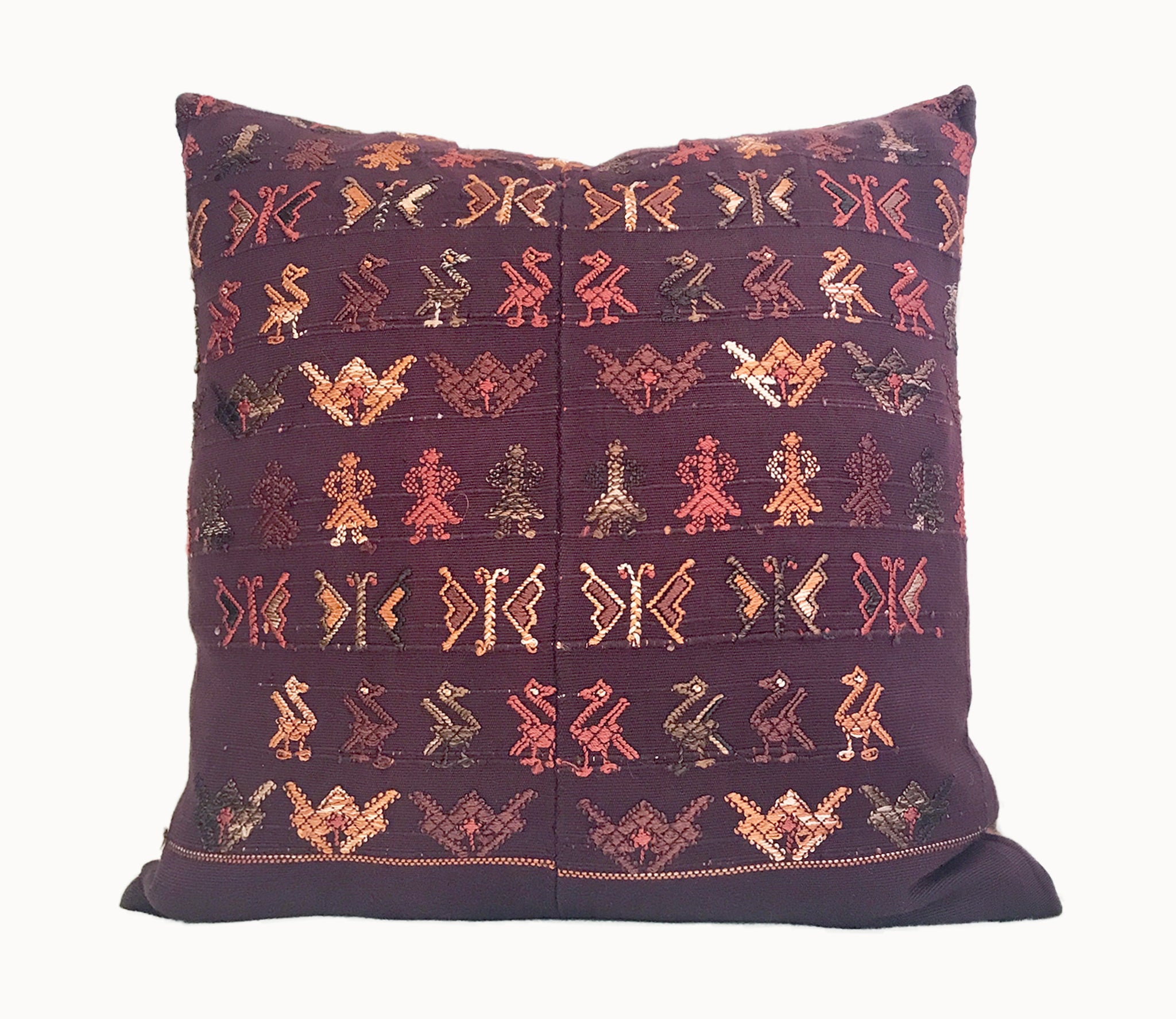 Brown Guatemalan embroidered huipil pillow.