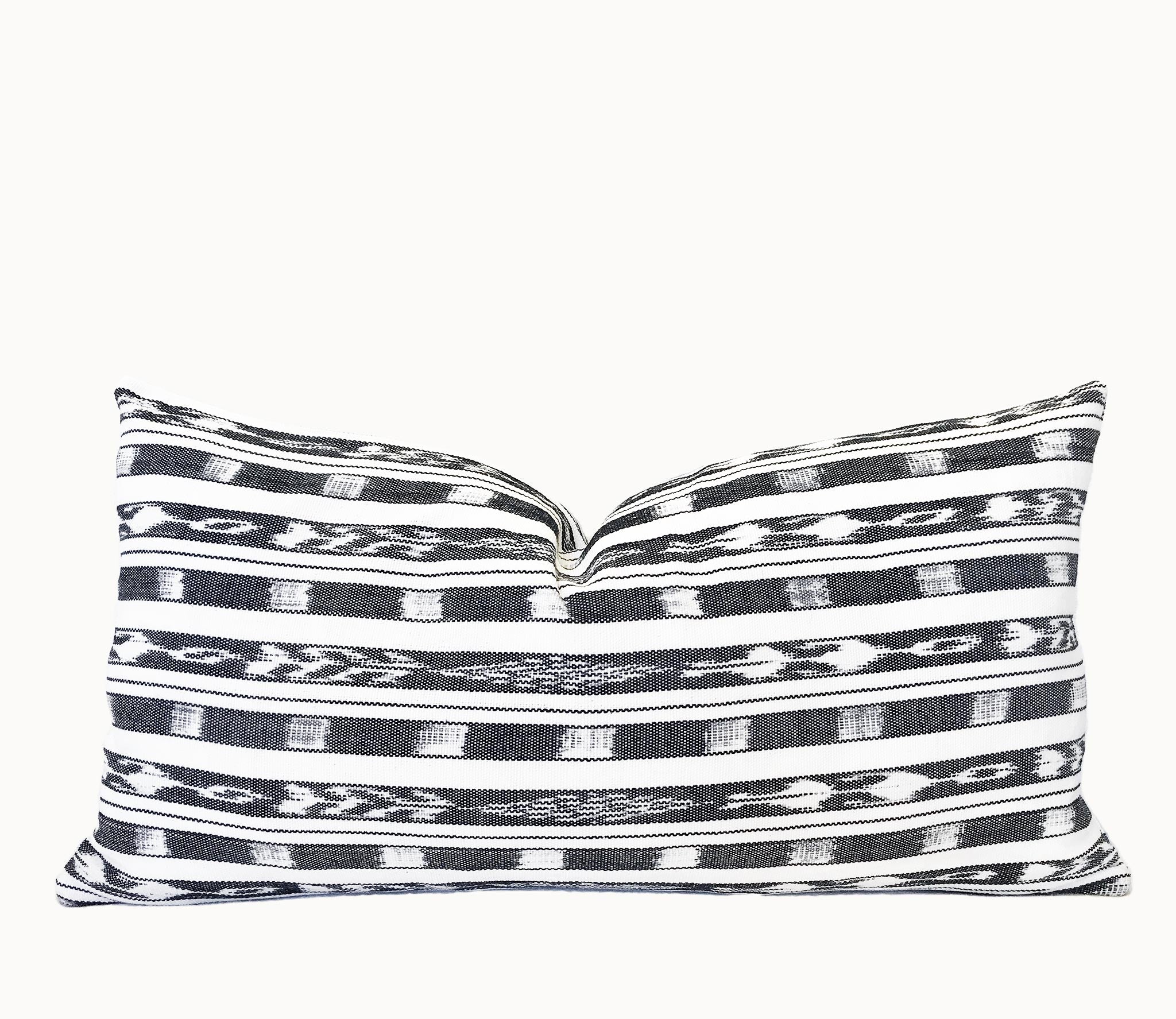 Black and orders white ikat pillow