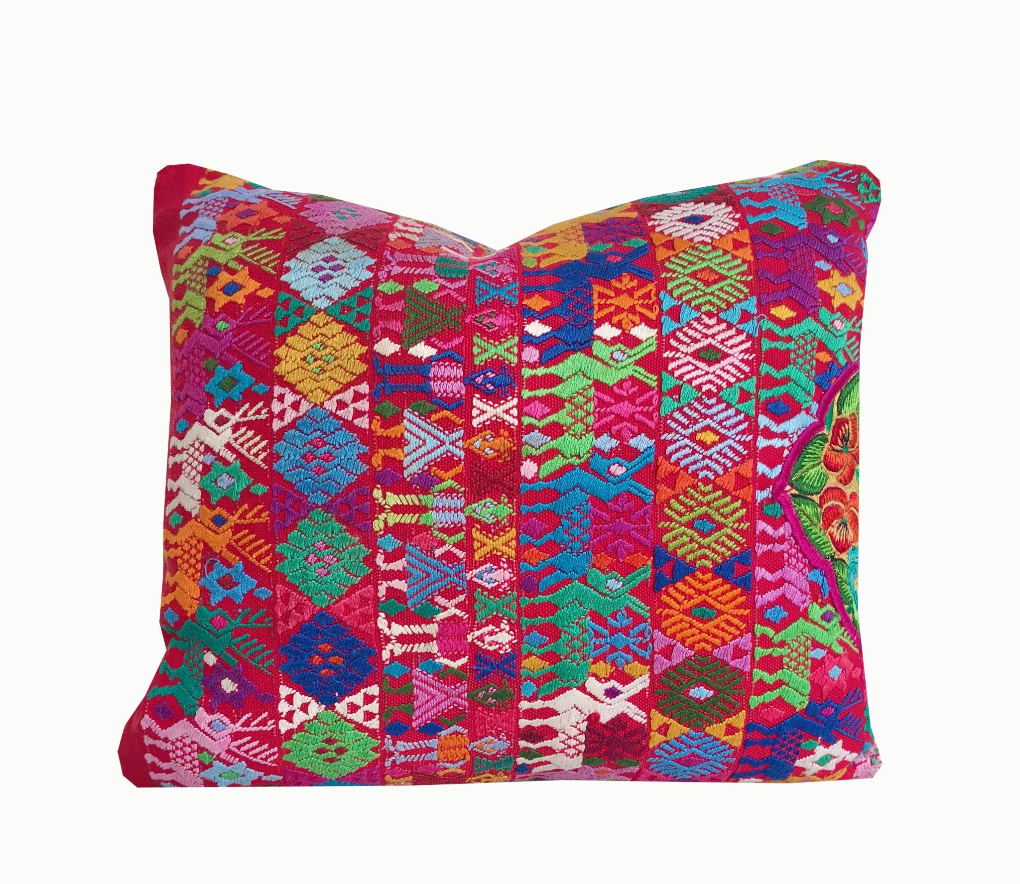 A pair of Guatemalan Huipil Pillows, vintage, hand embroidered Coban textile of brightly coloured tribal figures over a red cotton