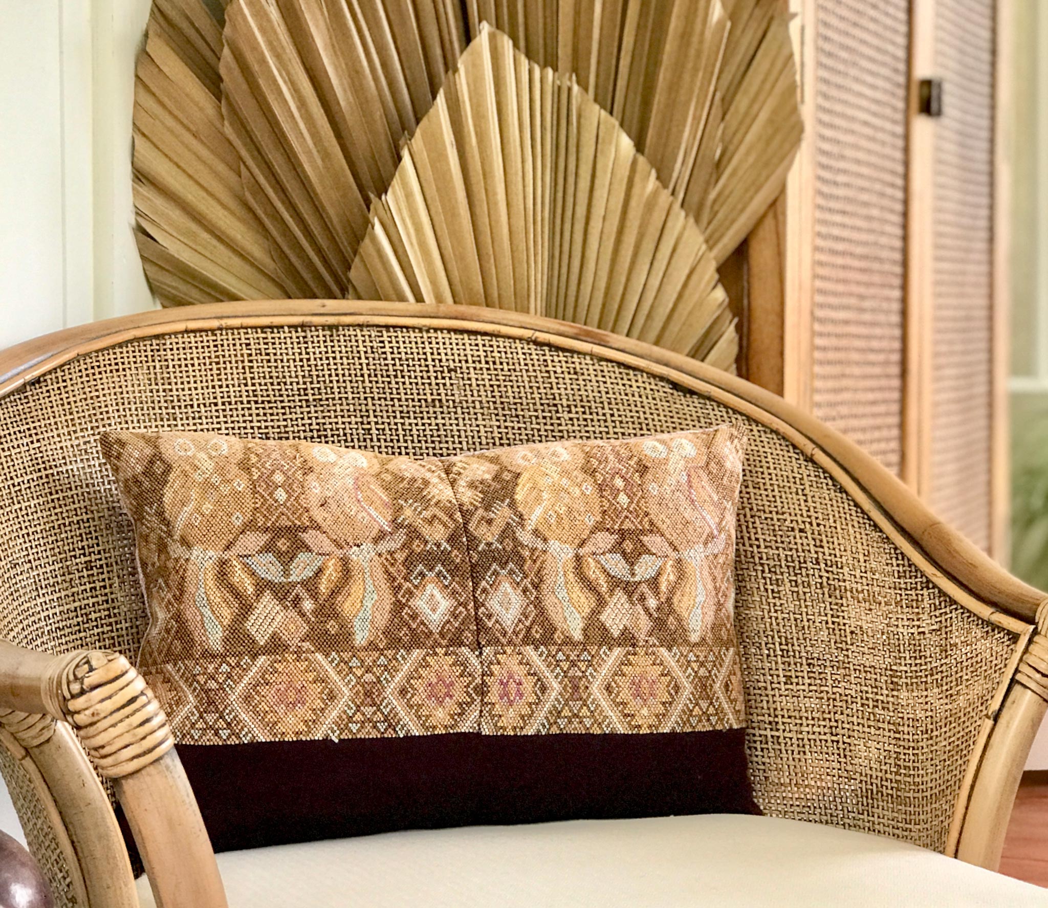 Embroidered Guatemalan huipil textile repurposed into a pillow