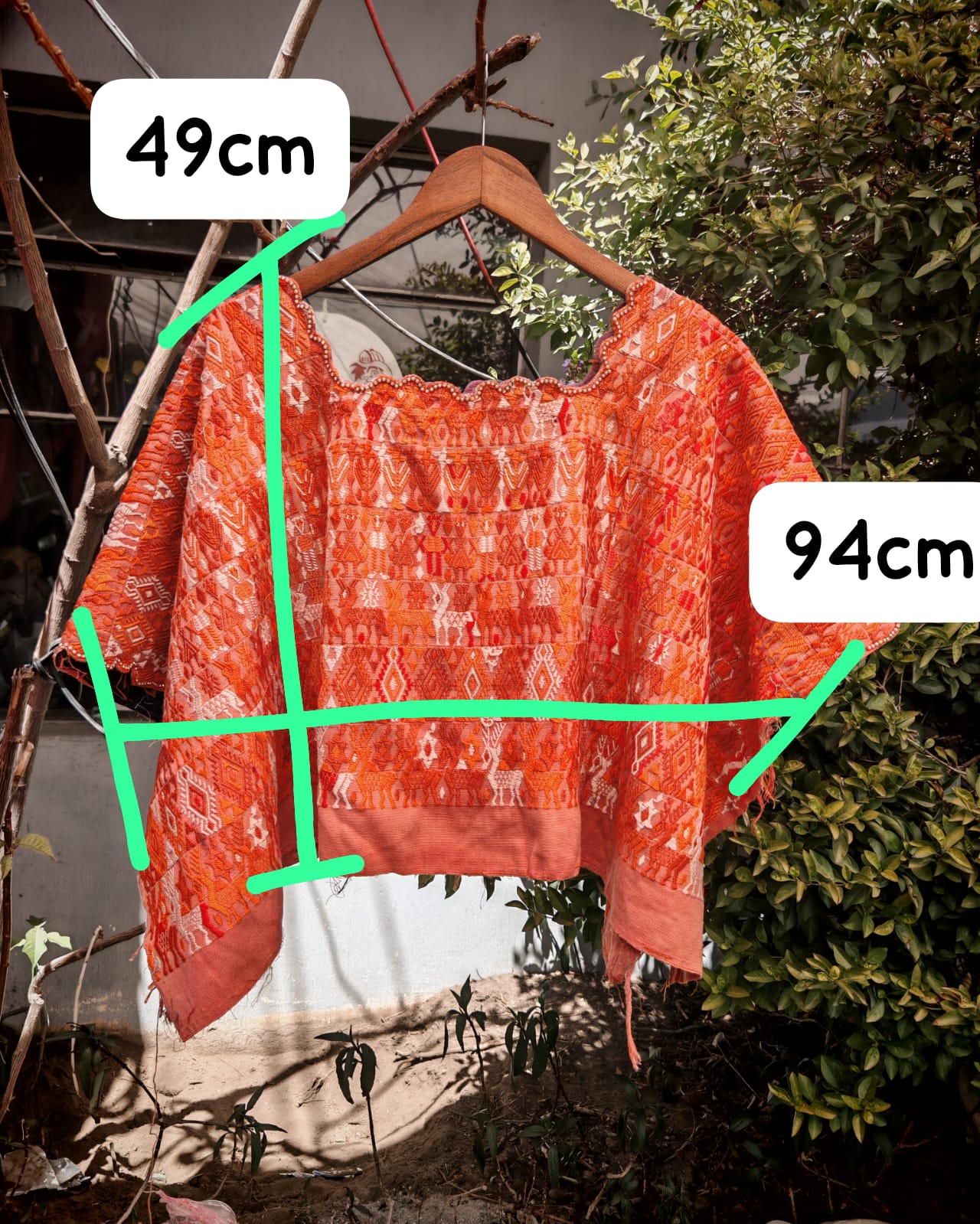 Orange Coban huipil for April