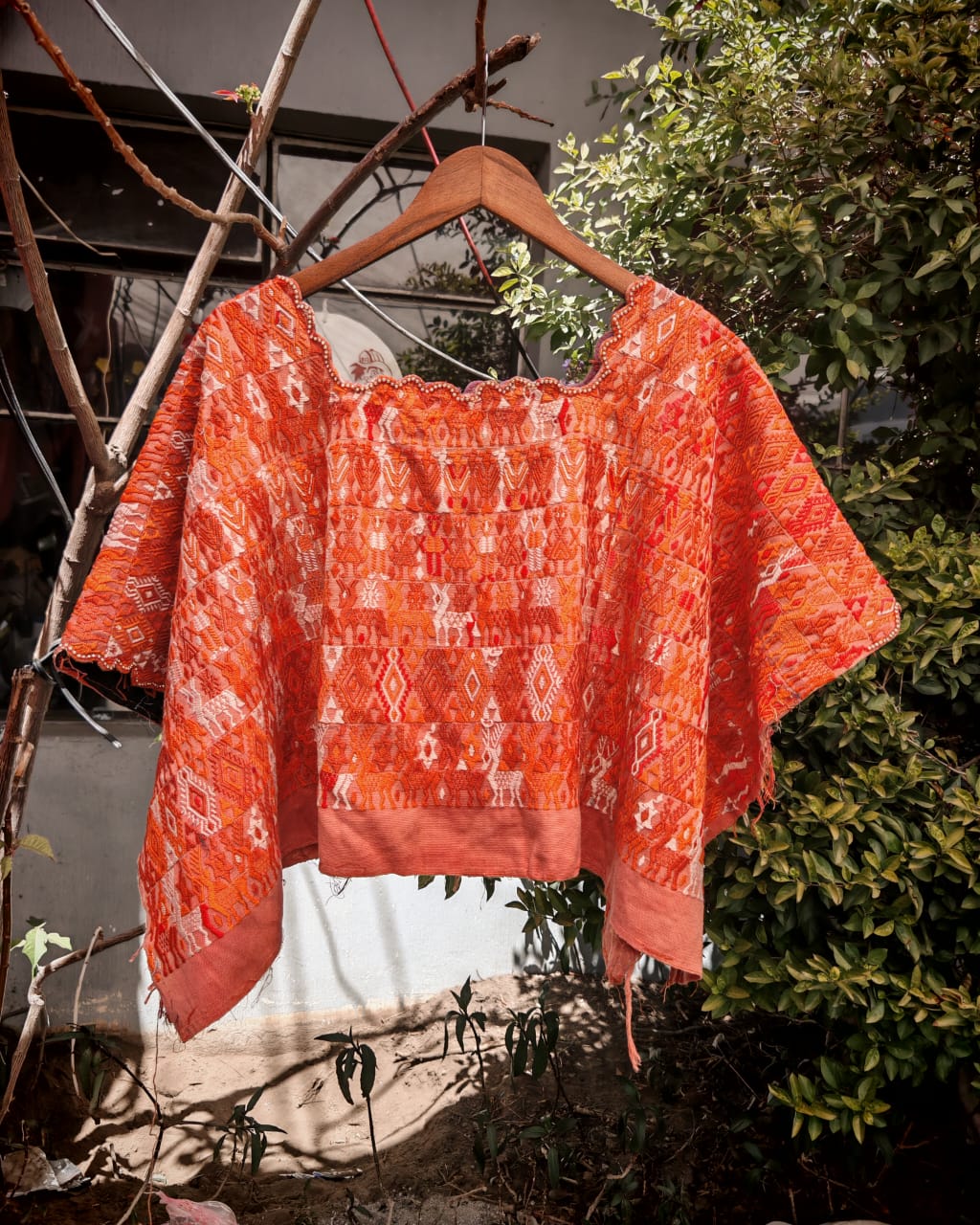 Orange Coban huipil for April