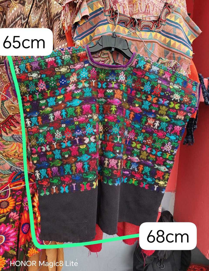 Black with animal motifs Coban huipil #5-183