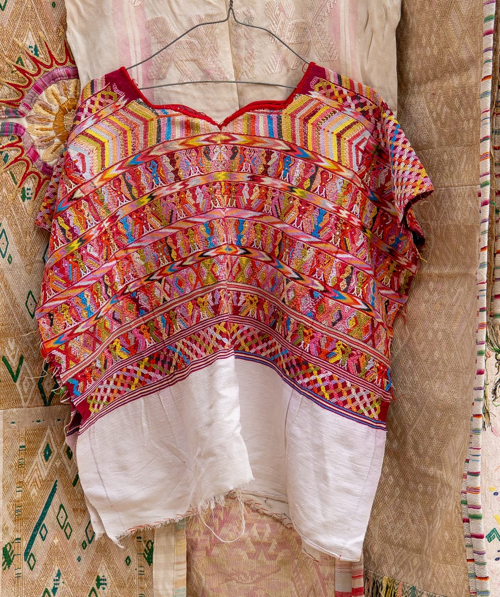 Red and white San Juan Cotzal huipil (reserved for April)