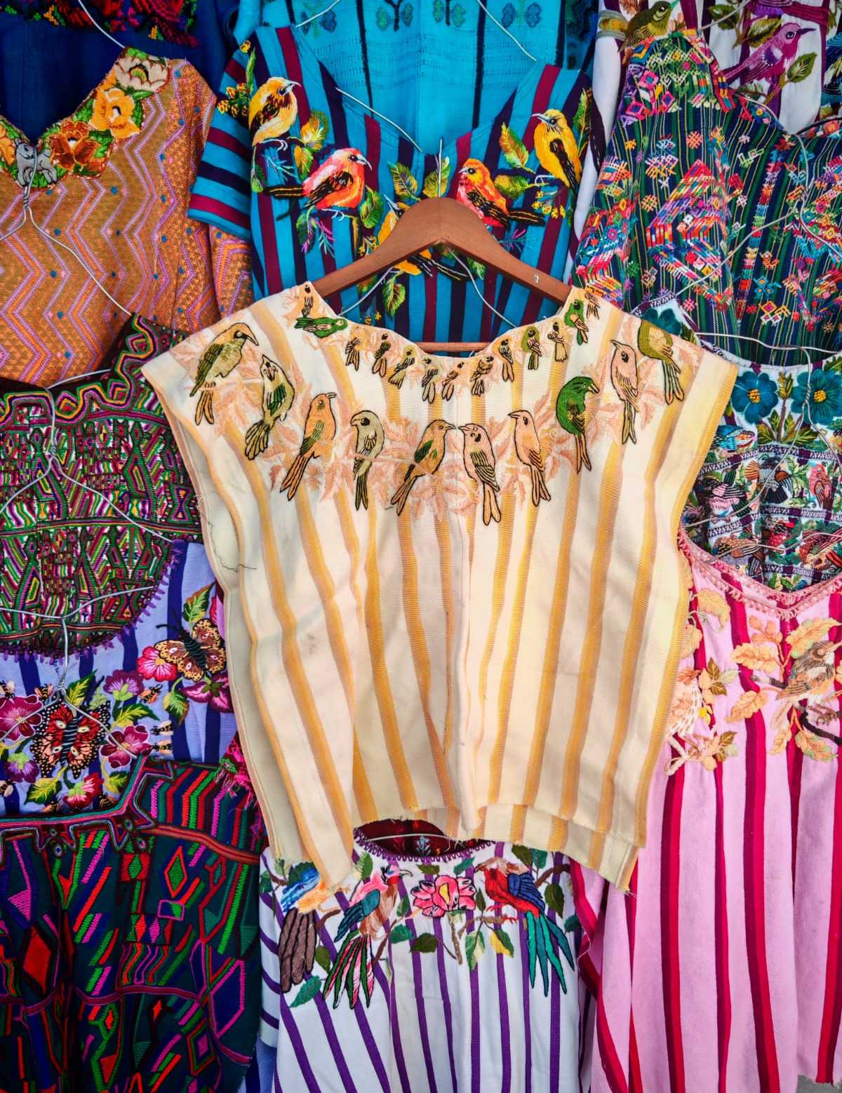 Santiago huipil and Nebaj huipil (reserved for Ofelia)