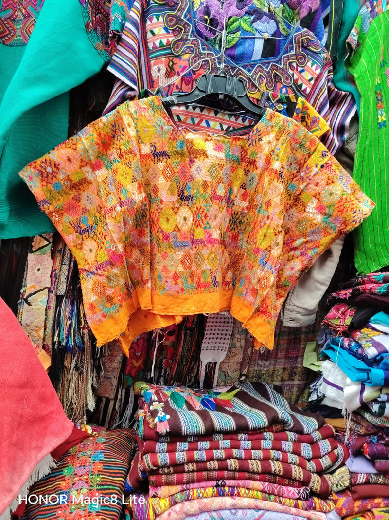 Colourful on orange Coban huipil (Reserved for April)