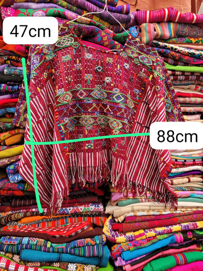 Red Colotenango huipil for April