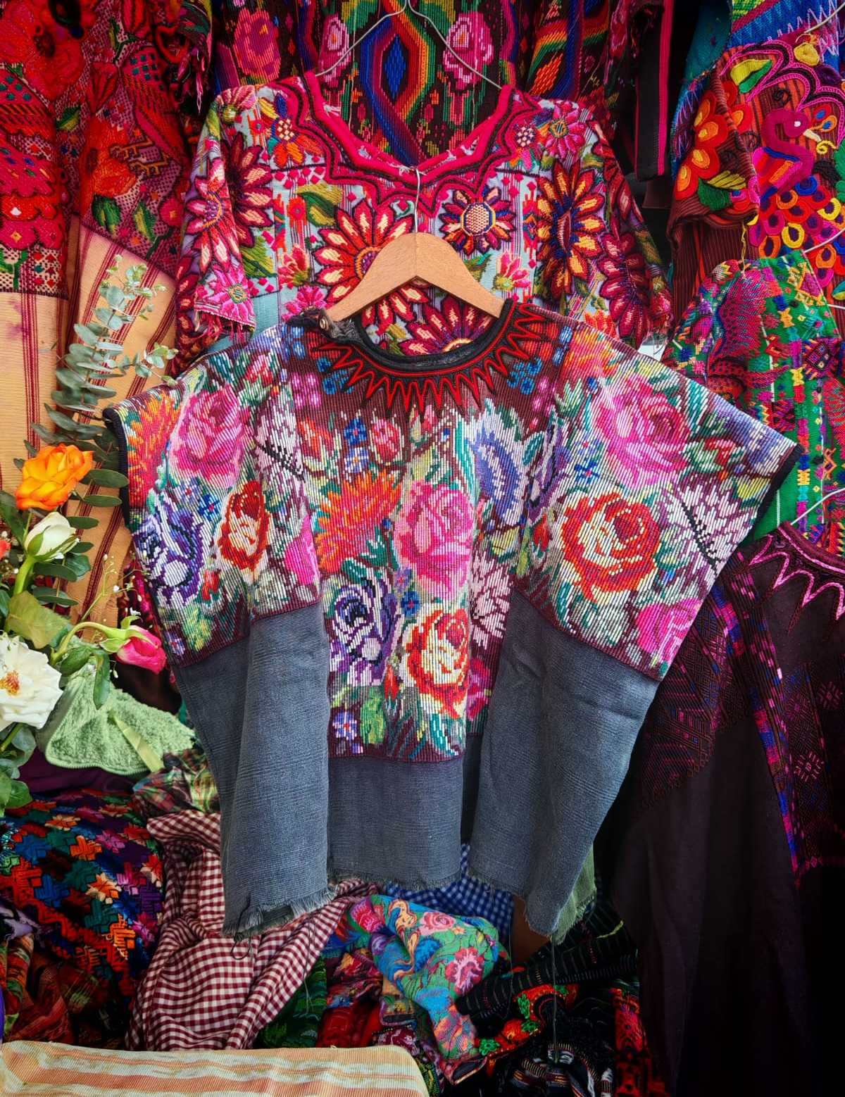 Colourful on black Chichicastenango huipil #6-23