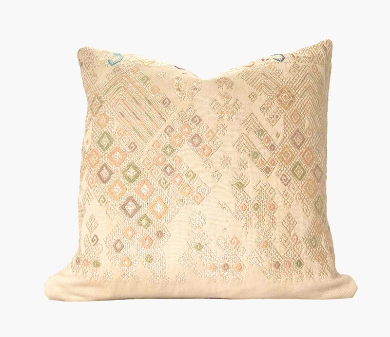 Embroidered Guatemalan huipil textile repurposed into a pillow