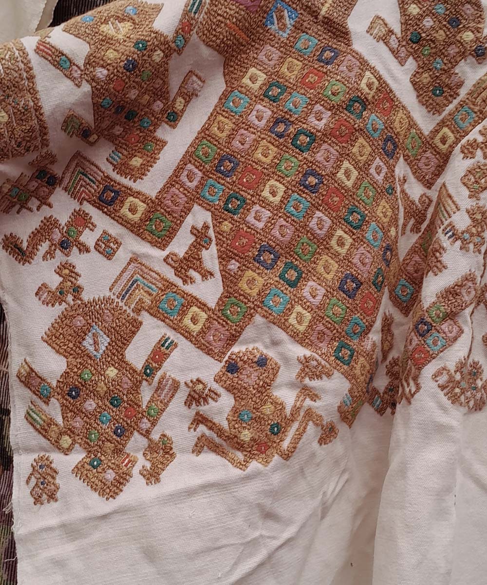 Brown and white Nahuala huipil